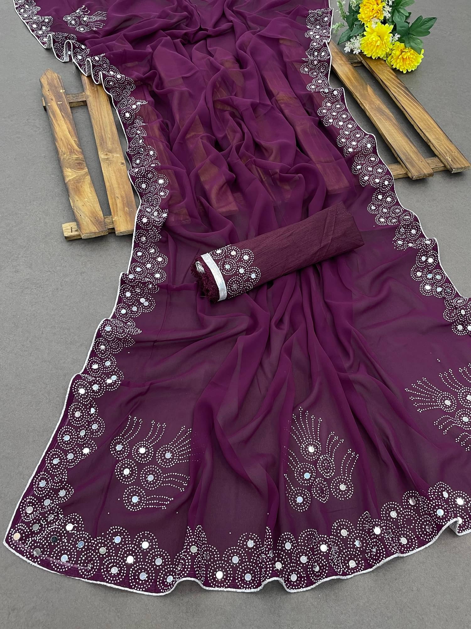     			VEERAIVA Georgette Embellished Saree With Unstitched Blouse Piece ( Wine )