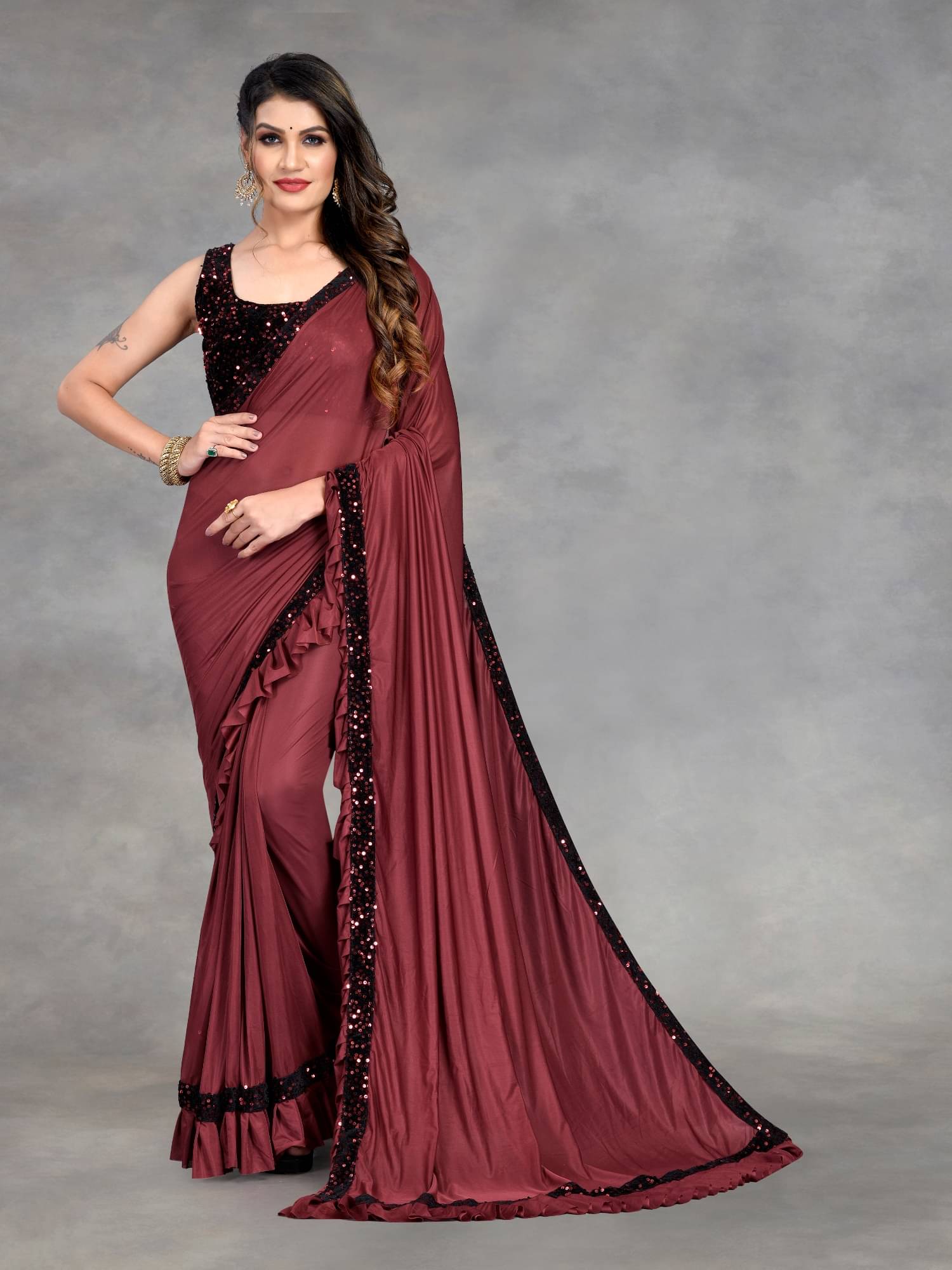 Lady Shopi Lycra Embellished Saree With Unstitched Blouse Piece ( Maroon ) Lady Shopi Lycra Embellished Saree With Unstitched Blouse Piece ( Maroon )