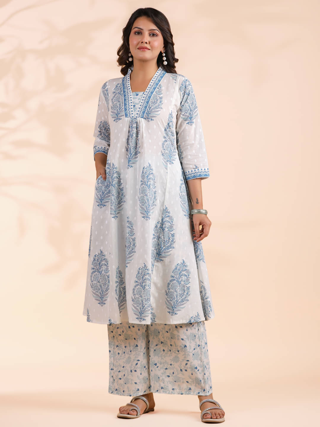 Vbuyz Cotton Printed Kurti With Palazzo Women's Stitched Salwar Suit - Blue ( Pack of 1 )     			Vbuyz Cotton Printed Kurti With Palazzo Women's Stitched Salwar Suit - Blue ( Pack of 1 )