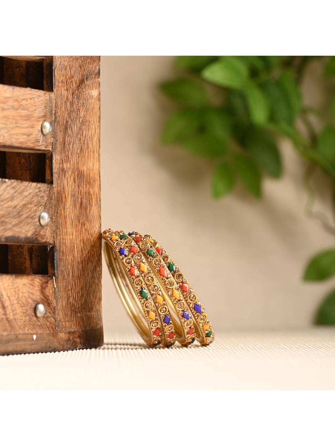Somil Multicolor Bangle Set ( Pack of 12 ) Somil Multicolor Bangle Set ( Pack of 12 )