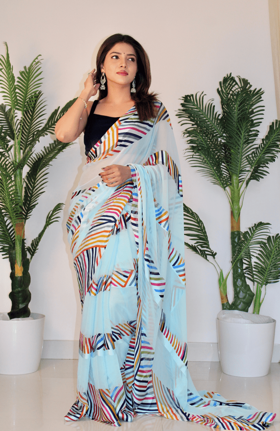     			Sitanjali Georgette Printed Saree With Unstitched Blouse Piece ( SkyBlue )