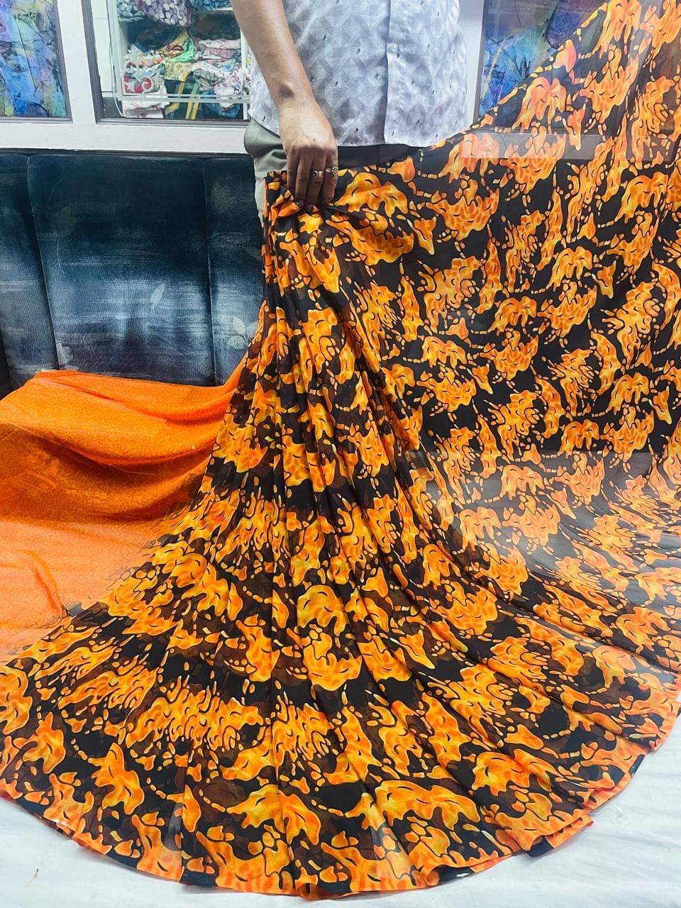     			Sitanjali Georgette Printed Saree With Unstitched Blouse Piece ( Orange )