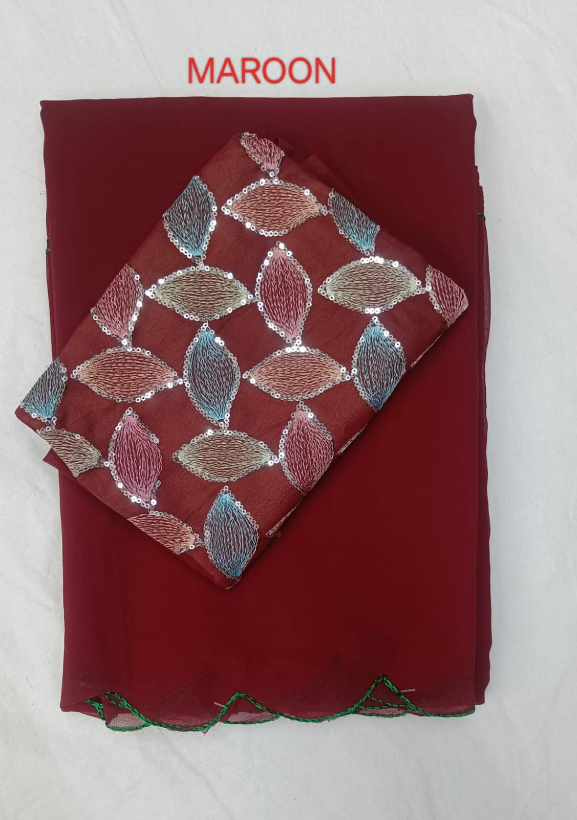 Kalpana Creation Georgette Solid Saree With Unstitched Blouse Piece ( Maroon ) Kalpana Creation Georgette Solid Saree With Unstitched Blouse Piece ( Maroon )