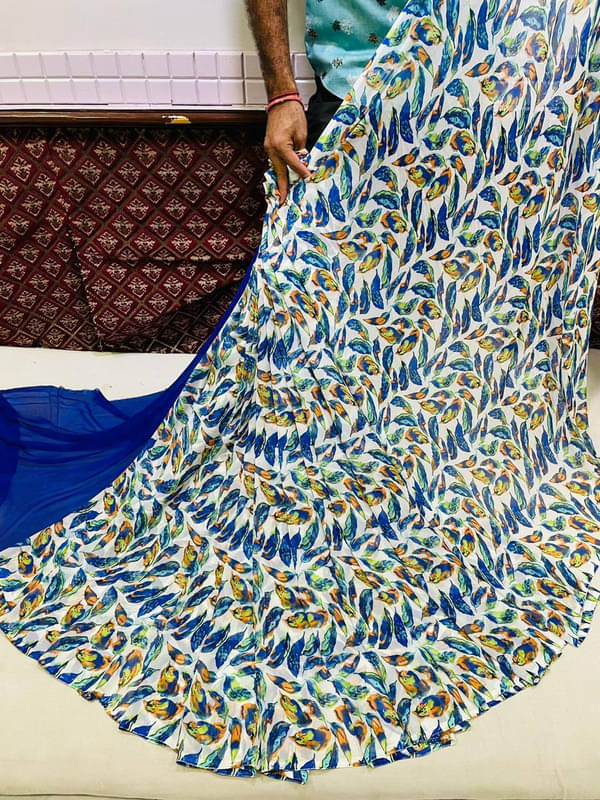     			Sitanjali Georgette Printed Saree With Unstitched Blouse Piece ( Blue )