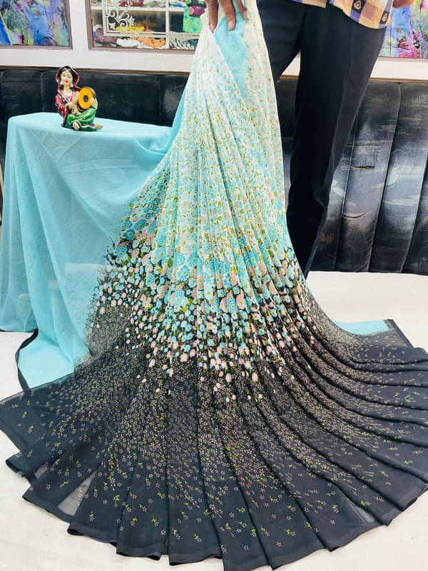     			Sitanjali Georgette Printed Saree With Unstitched Blouse Piece ( Teal )