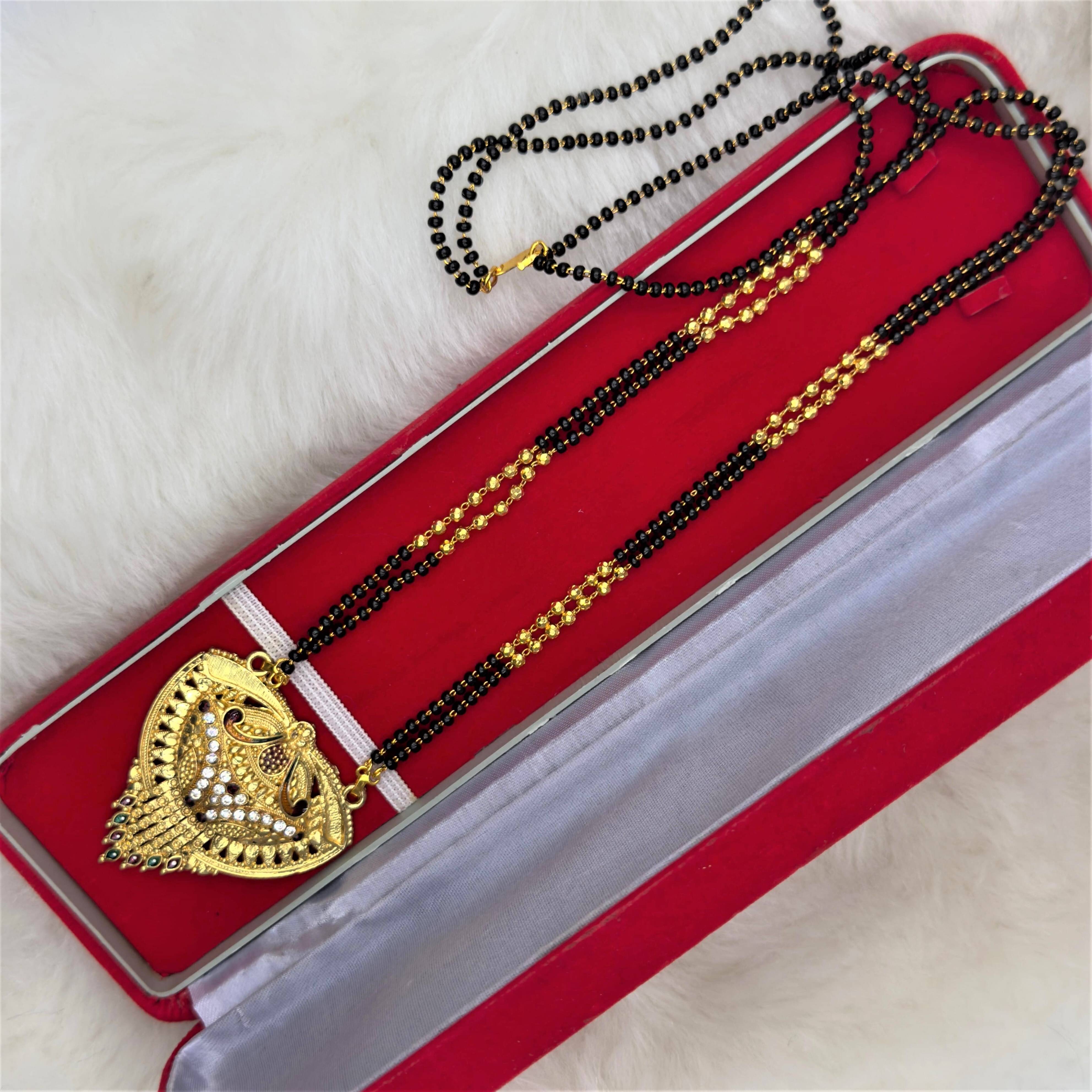 Charms Golden Mangalsutra ( Pack of 1 )     			Charms Golden Mangalsutra ( Pack of 1 )