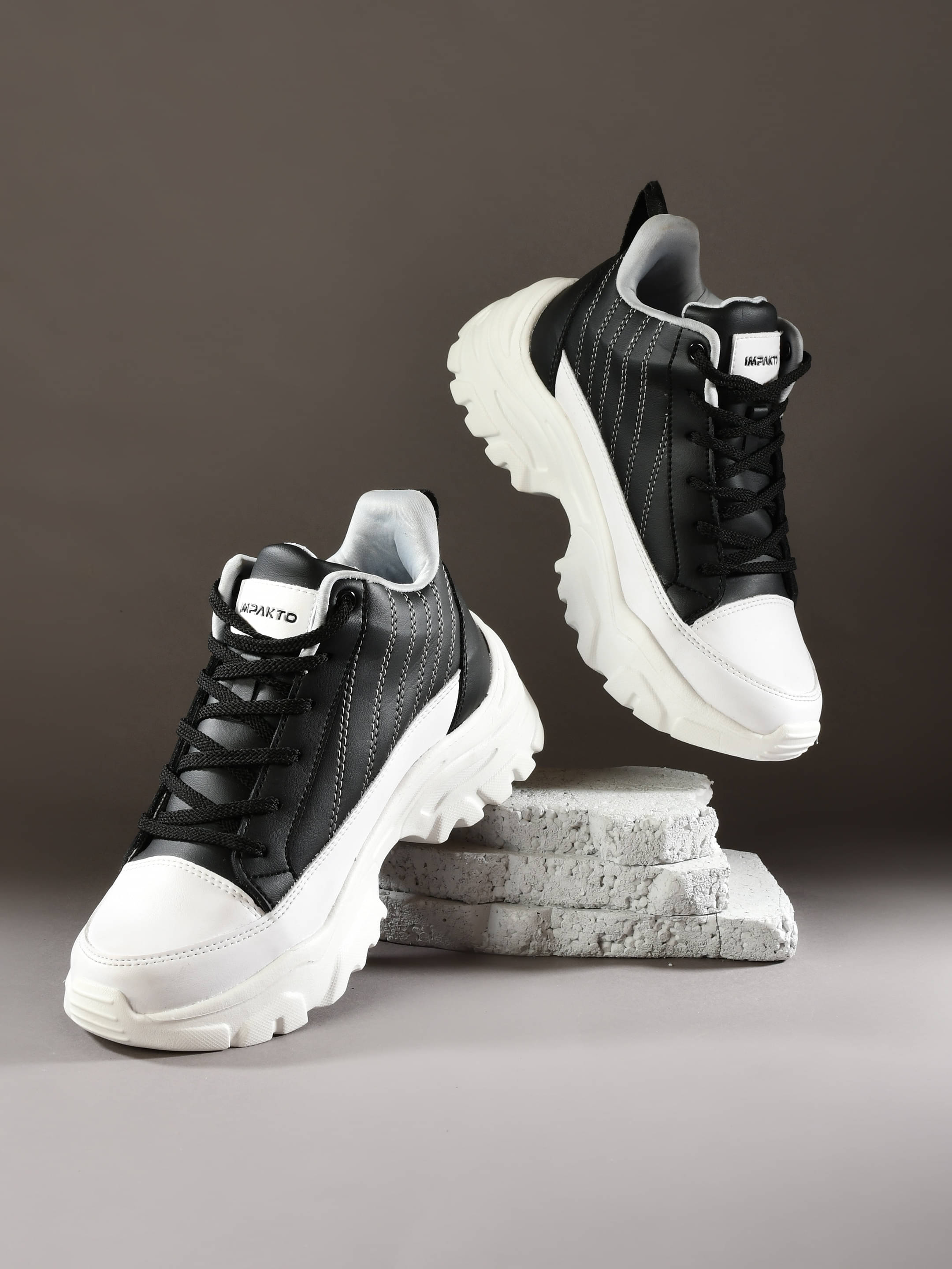     			Impakto Black Women's Sneakers