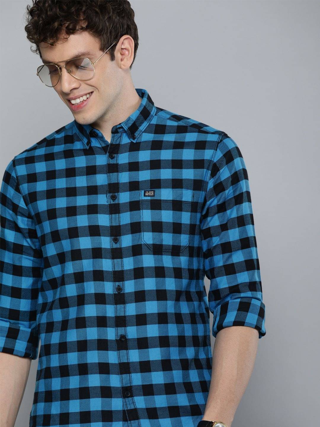 The Indian Garage Co Men Blue & Black Slim Fit Checked Casual Shirt     			The Indian Garage Co Men Blue & Black Slim Fit Checked Casual Shirt