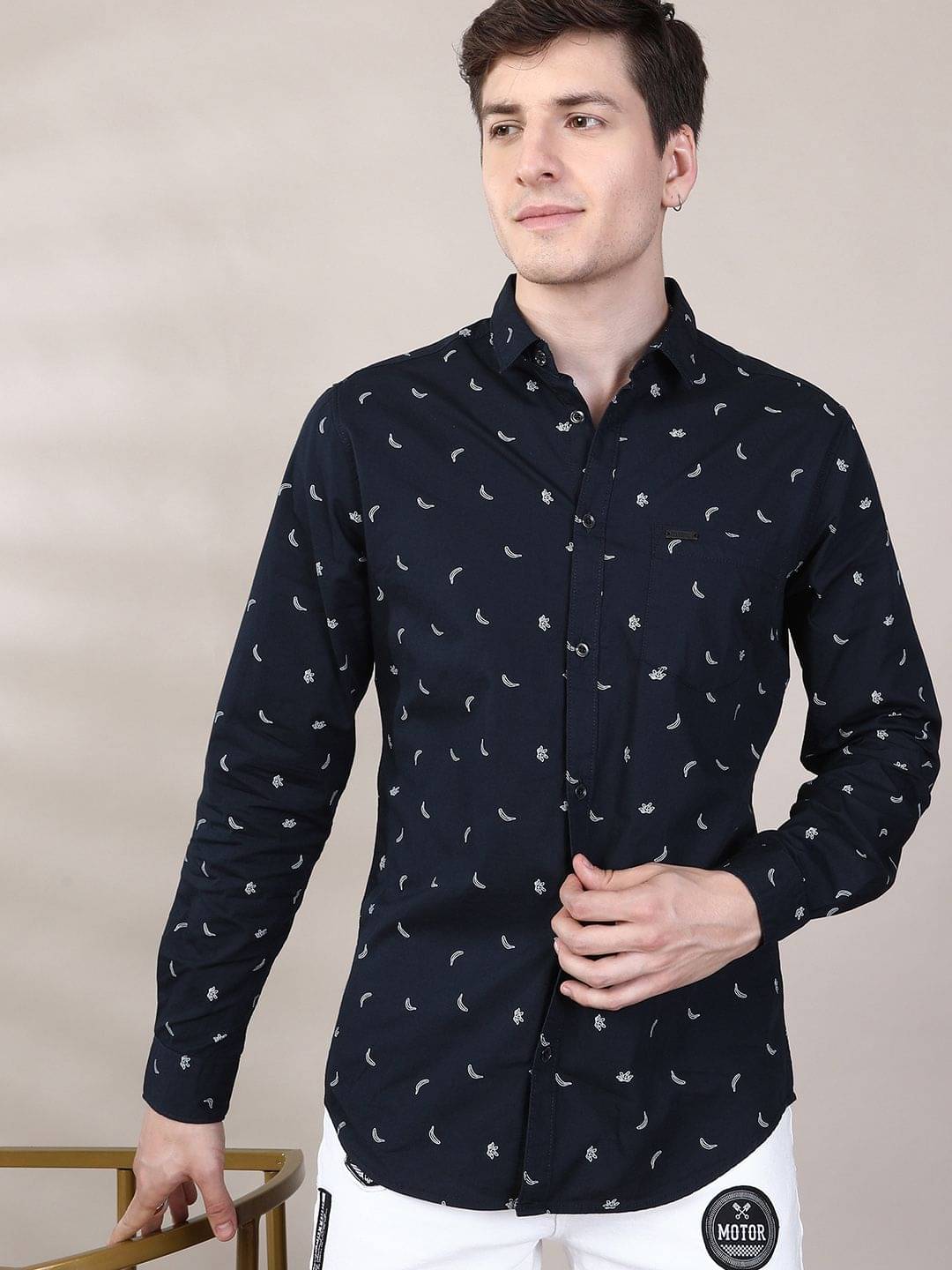     			The Indian Garage Co Men Navy Blue Slim Fit Conversational Printed Casual Shirt
