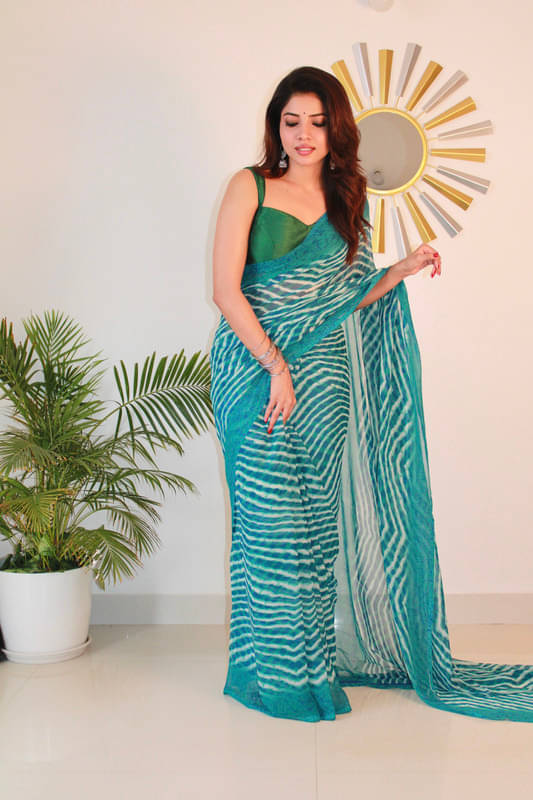 Sanjana Silks Georgette Printed Saree With Unstitched Blouse Piece ( Blue ) Sanjana Silks Georgette Printed Saree With Unstitched Blouse Piece ( Blue )