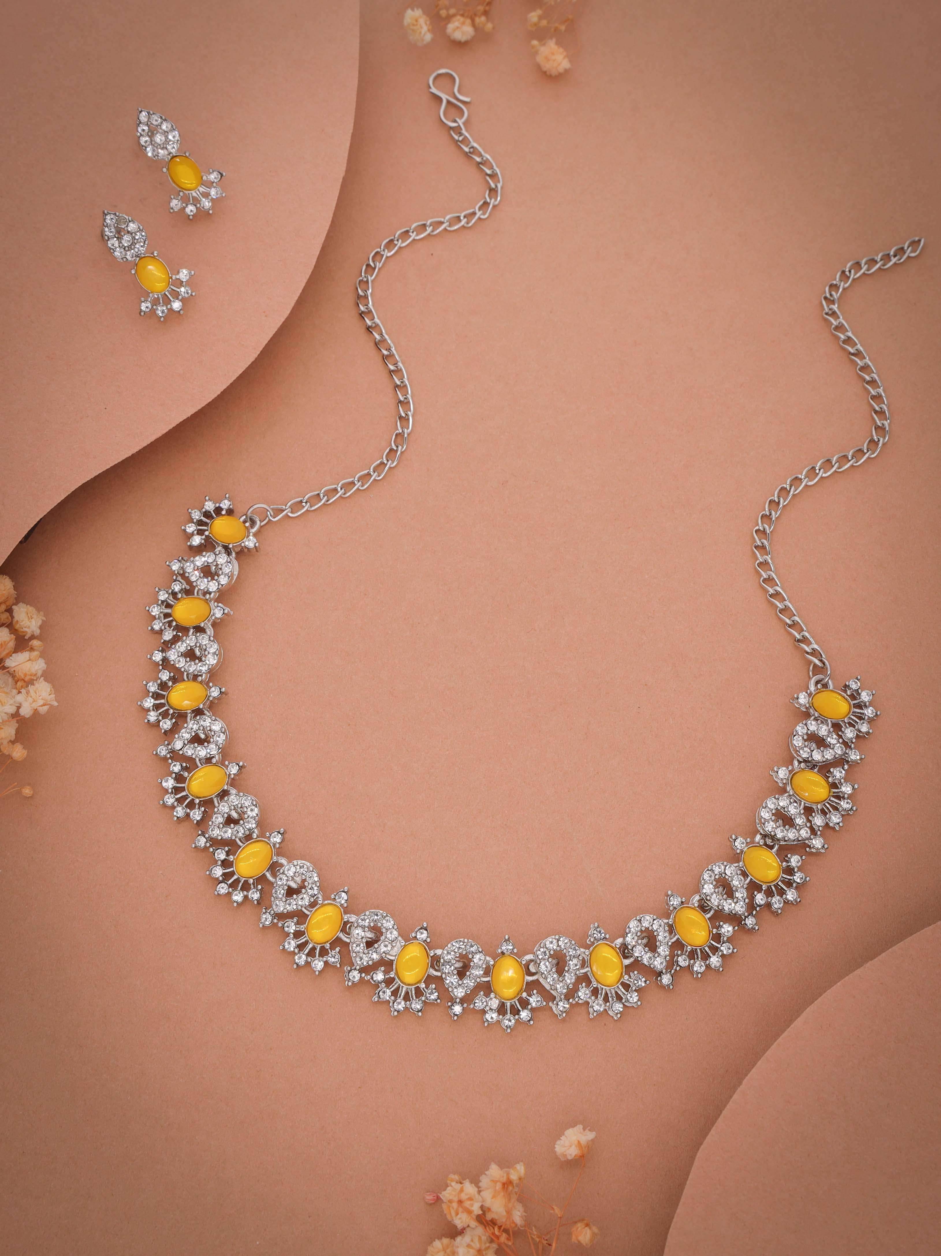     			Lyriss Yellow Brass Necklace Set ( Pack of 1 )