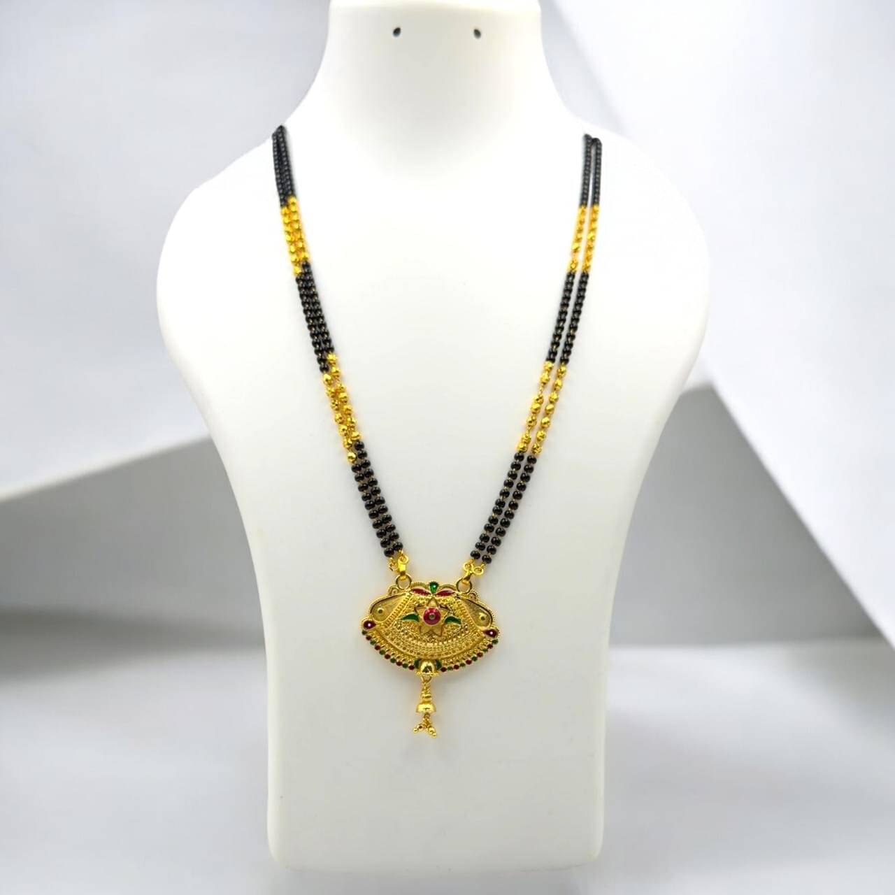     			AKLINA Golden Mangalsutra ( Pack of 1 )