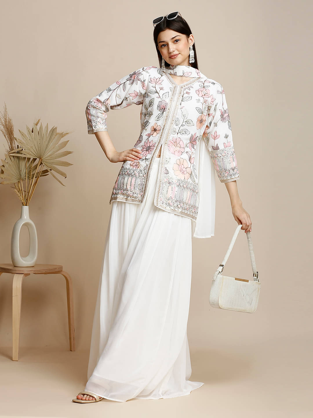 Madhuram Textiles Georgette Embellished Kurti With Skirt Women's Stitched Salwar Suit - White ( Pack of 1 ) Madhuram Textiles Georgette Embellished Kurti With Skirt Women's Stitched Salwar Suit - White ( Pack of 1 )