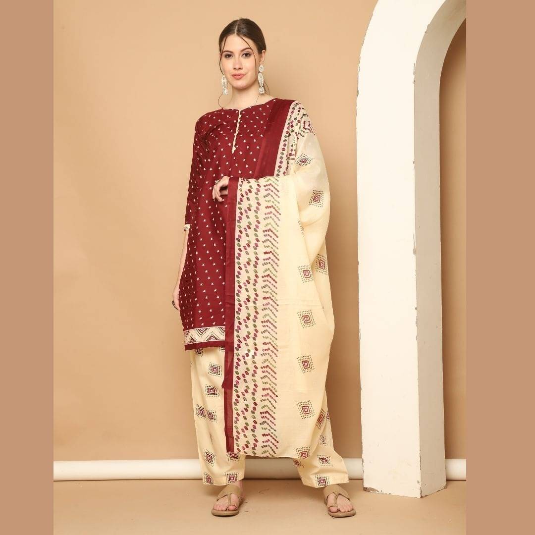     			Rajnandini Women Cotton Blend Printed Straight Kurti With Patiala Salwar ( Maroon )