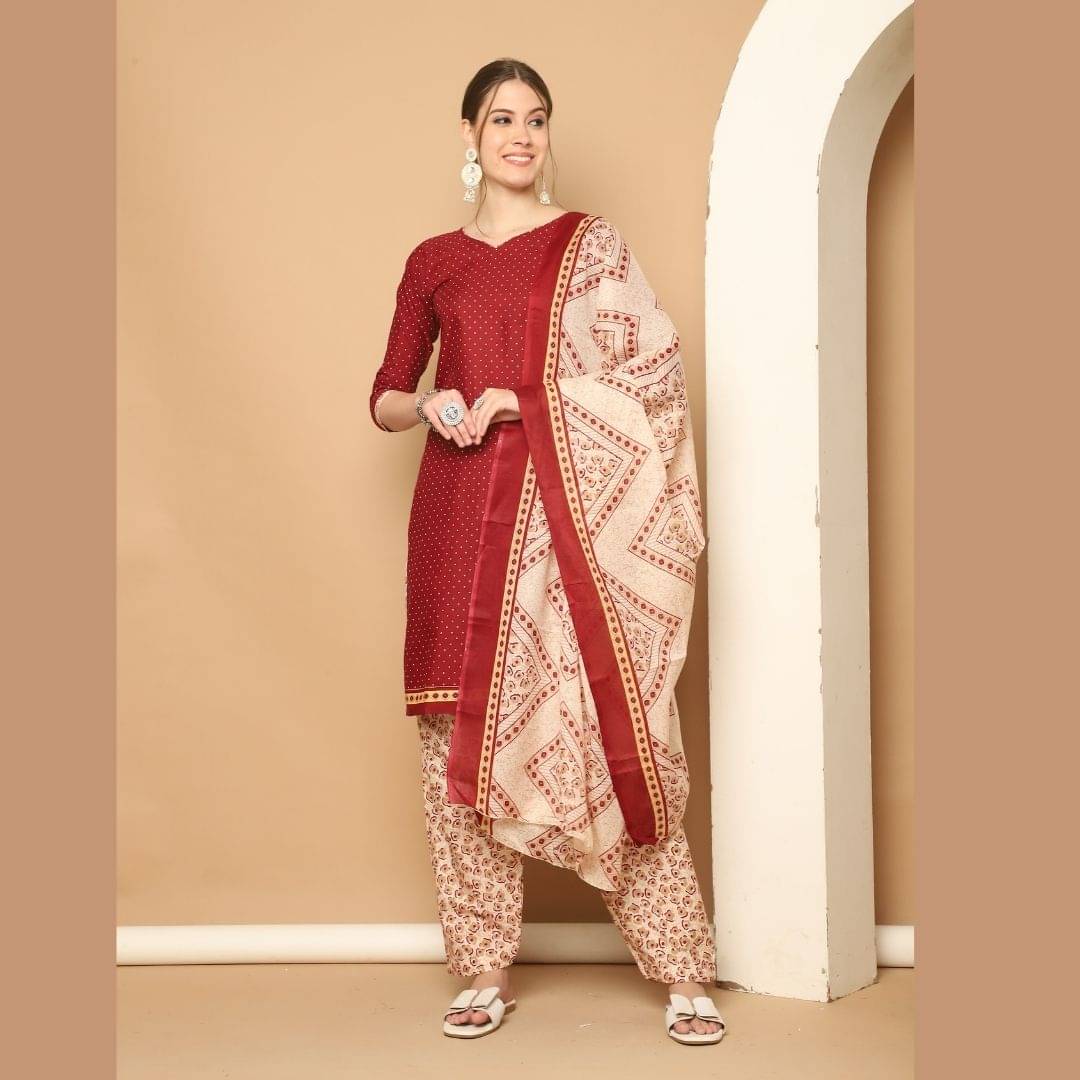     			Rajnandini Women Cotton Blend Printed Straight Kurti With Patiala Salwar ( Maroon )
