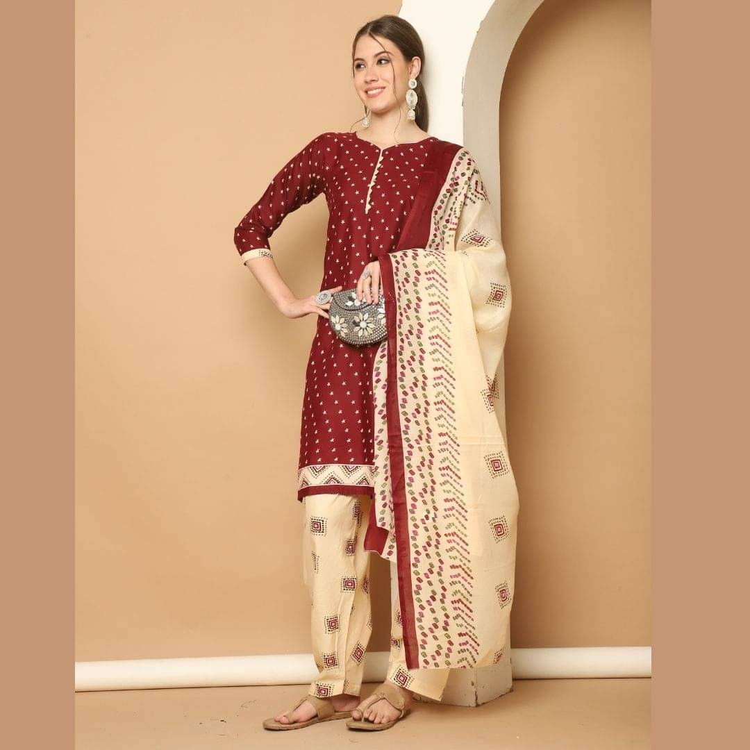     			Rajnandini Women Cotton Blend Printed Straight Kurti With Patiala Salwar ( Maroon )