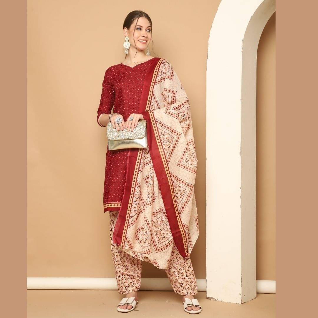     			Rajnandini Women Cotton Blend Printed Straight Kurti With Patiala Salwar ( Maroon )