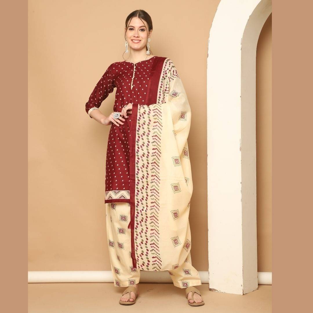     			Rajnandini Women Cotton Blend Printed Straight Kurti With Patiala Salwar ( Maroon )