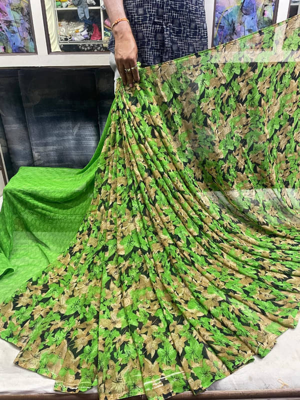 Sitanjali Lifestyle Georgette Printed Saree With Unstitched Blouse Piece ( Green ) Sitanjali Lifestyle Georgette Printed Saree With Unstitched Blouse Piece ( Green )