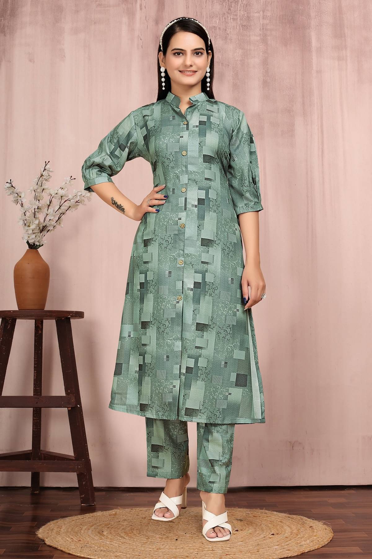 Aika Women Cotton Blend Printed Front Slit Kurti With Pants ( Green ) Aika Women Cotton Blend Printed Front Slit Kurti With Pants ( Green )