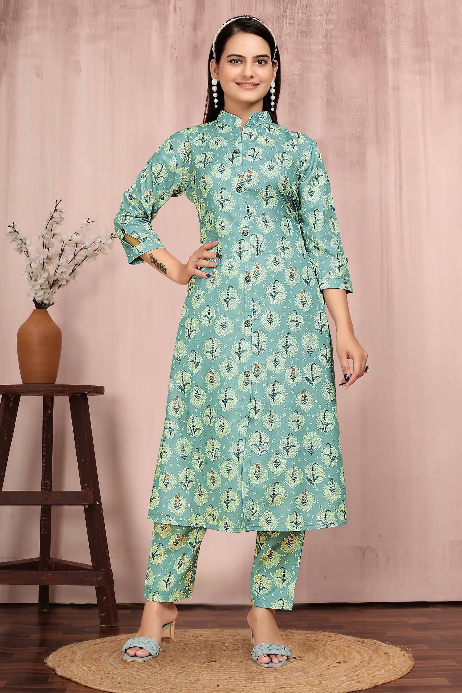 Aika Women Rayon Printed Front Slit Kurti With Pants ( Teal ) Aika Women Rayon Printed Front Slit Kurti With Pants ( Teal )
