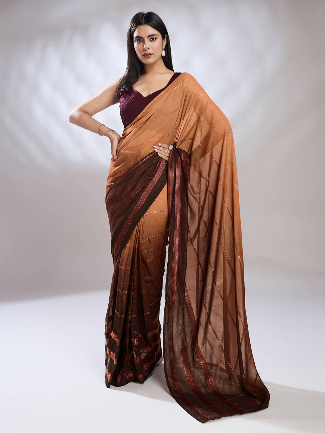 Rekha Maniyar Satin Striped Saree With Unstitched Blouse Piece ( Rust )     			Rekha Maniyar Satin Striped Saree With Unstitched Blouse Piece ( Rust )