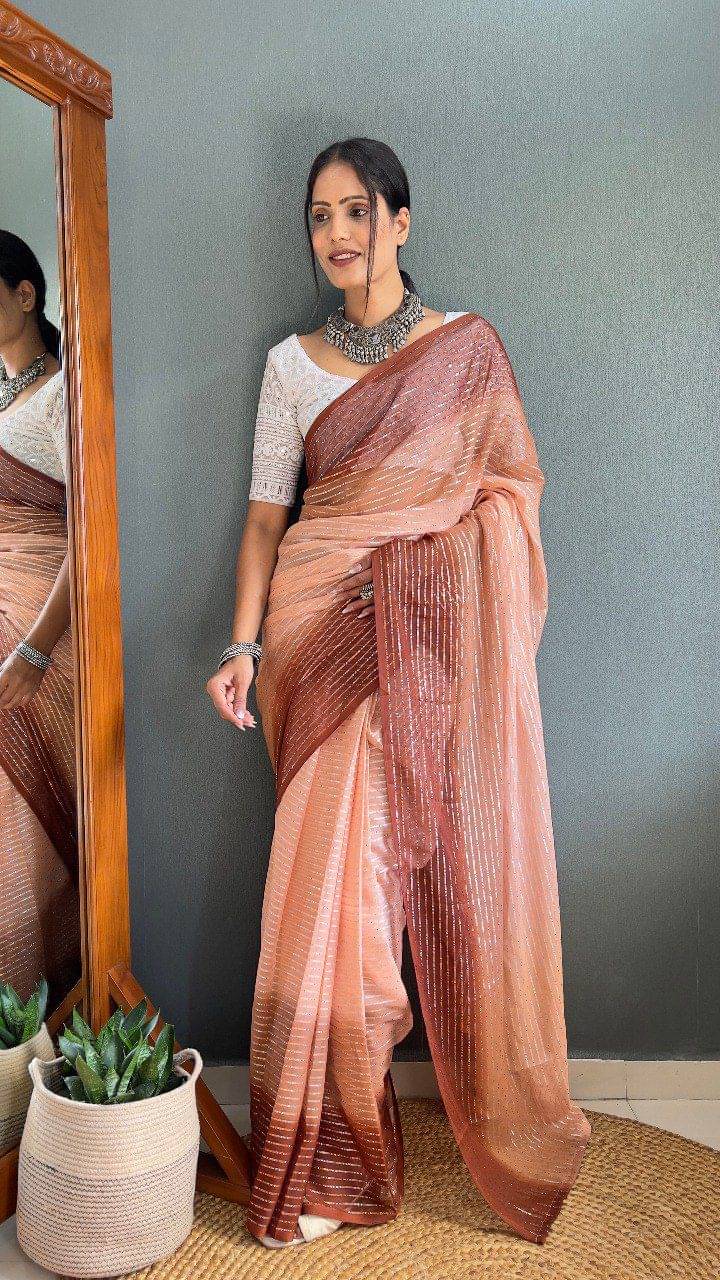 Apnisha Chiffon Embellished Saree With Unstitched Blouse Piece ( Peach ) Apnisha Chiffon Embellished Saree With Unstitched Blouse Piece ( Peach )
