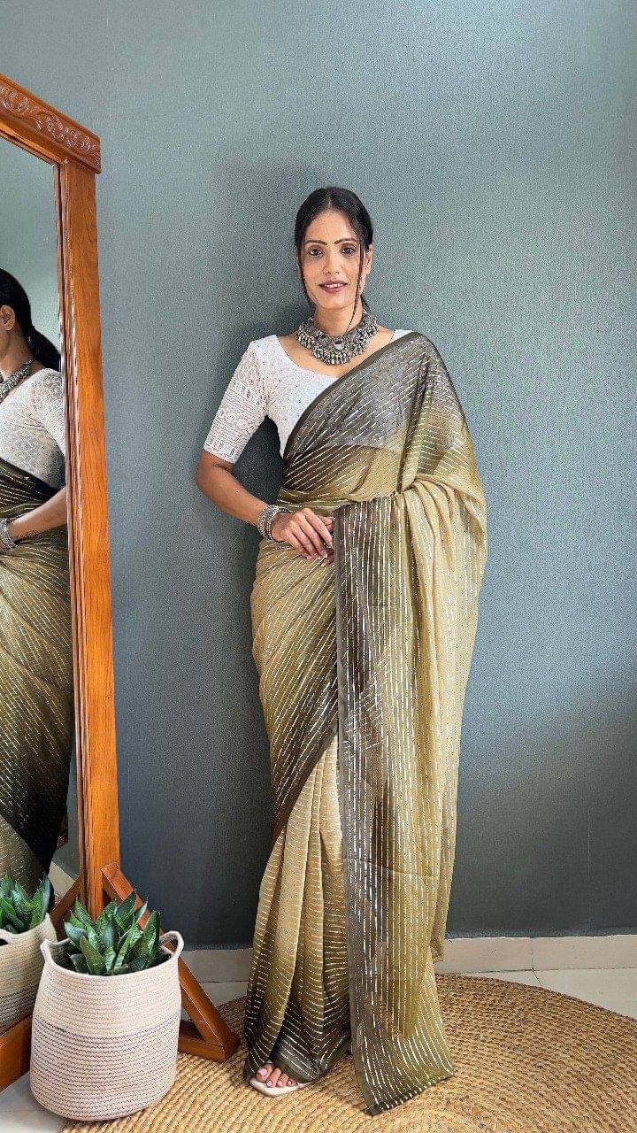     			Apnisha Chiffon Embellished Saree With Unstitched Blouse Piece ( Multicolor )