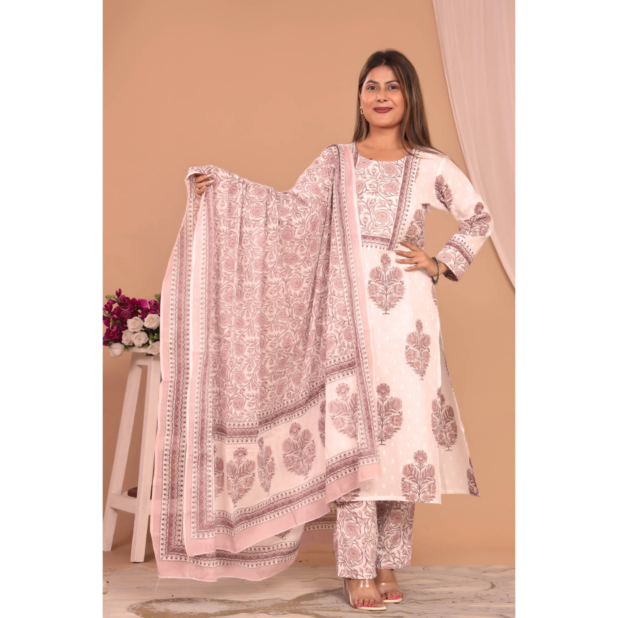 Avnii Cotton Printed Kurti With Pants Women's Stitched Salwar Suit - Peach ( Pack of 1 )     			Avnii Cotton Printed Kurti With Pants Women's Stitched Salwar Suit - Peach ( Pack of 1 )