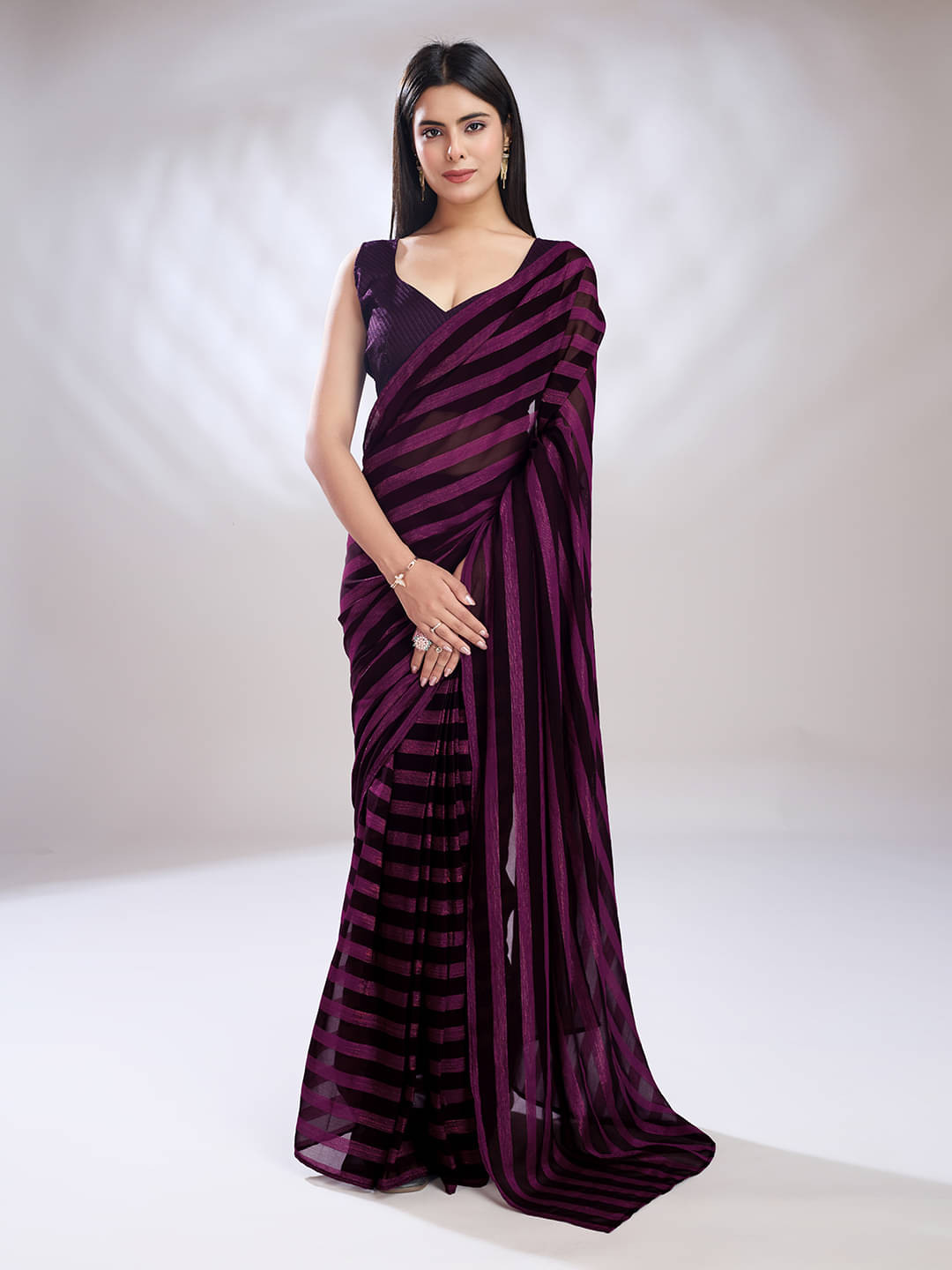 Rekha Maniyar Georgette Striped Saree With Unstitched Blouse Piece ( Magenta ) Rekha Maniyar Georgette Striped Saree With Unstitched Blouse Piece ( Magenta )