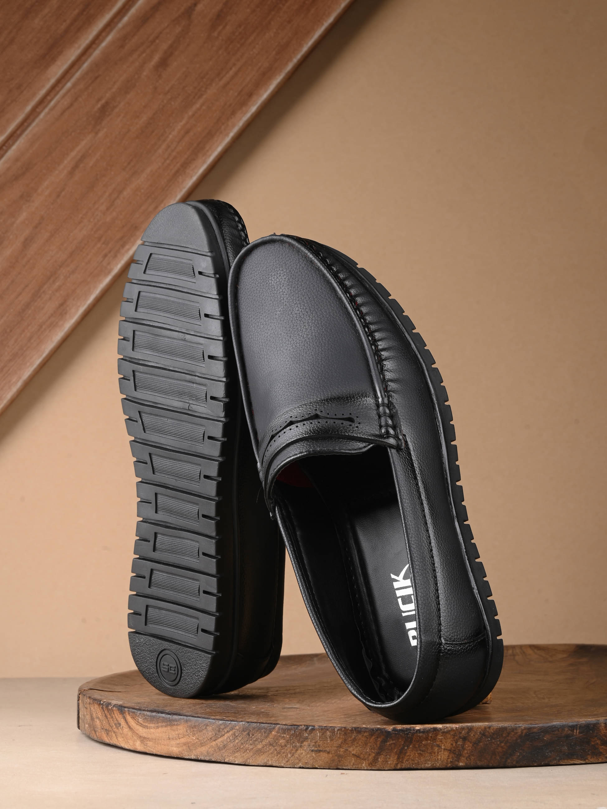     			Bucik Black Men's Slip on