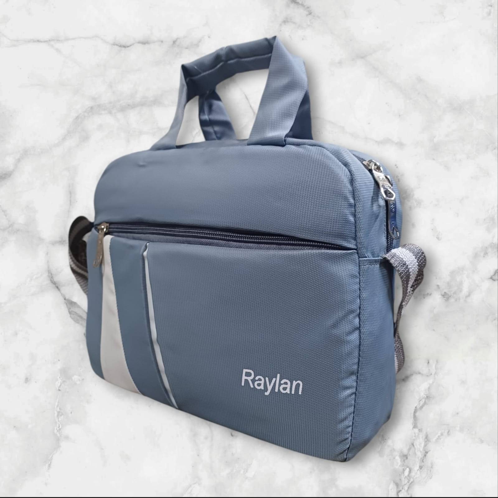     			Raylan Grey Solid Messenger Bag
