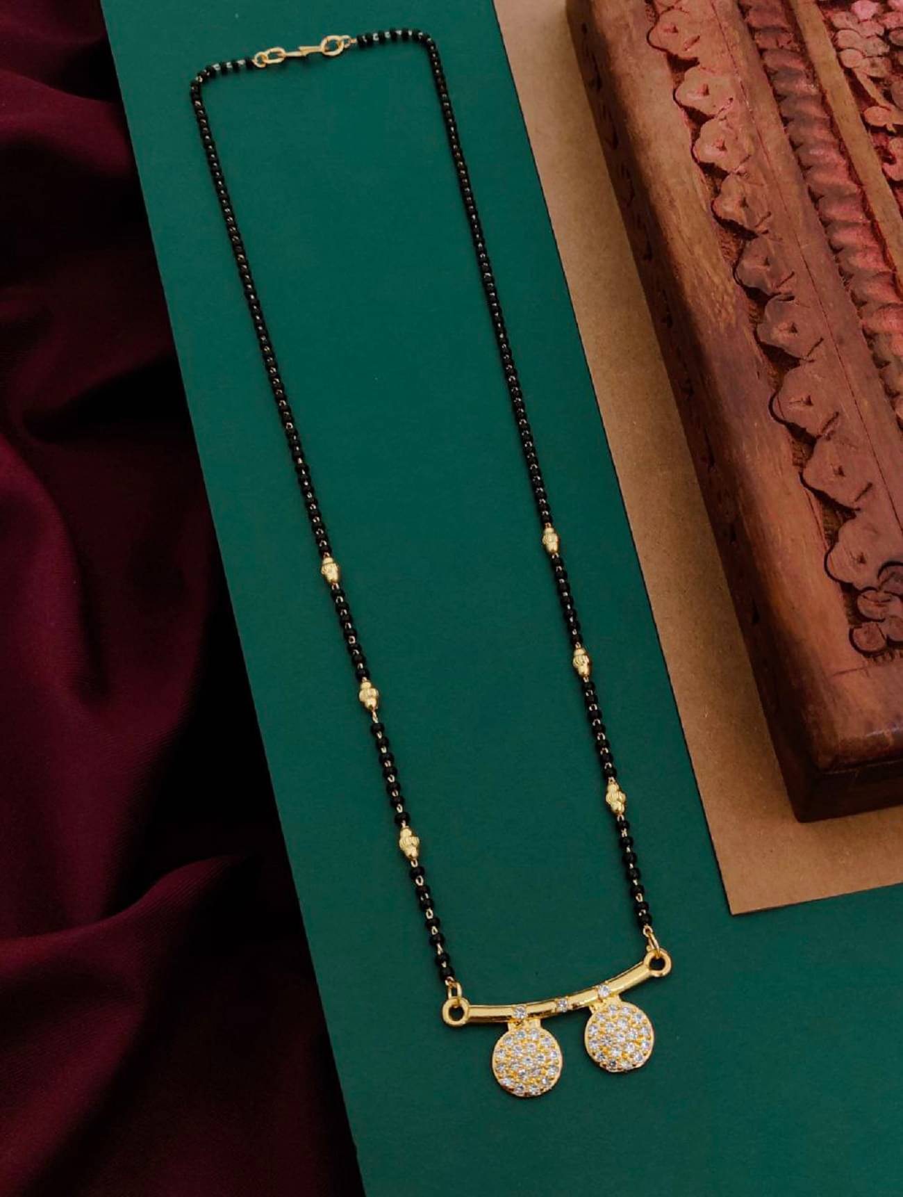     			KIRTAN ENT Golden Mangalsutra ( Pack of 1 )