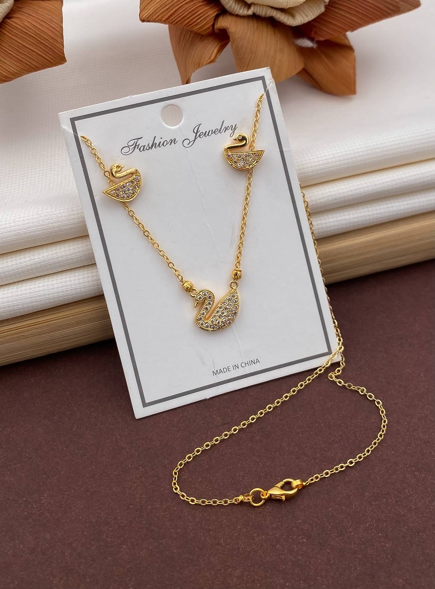     			KIRTAN ENT Golden Pendant set ( Pack of 1 )