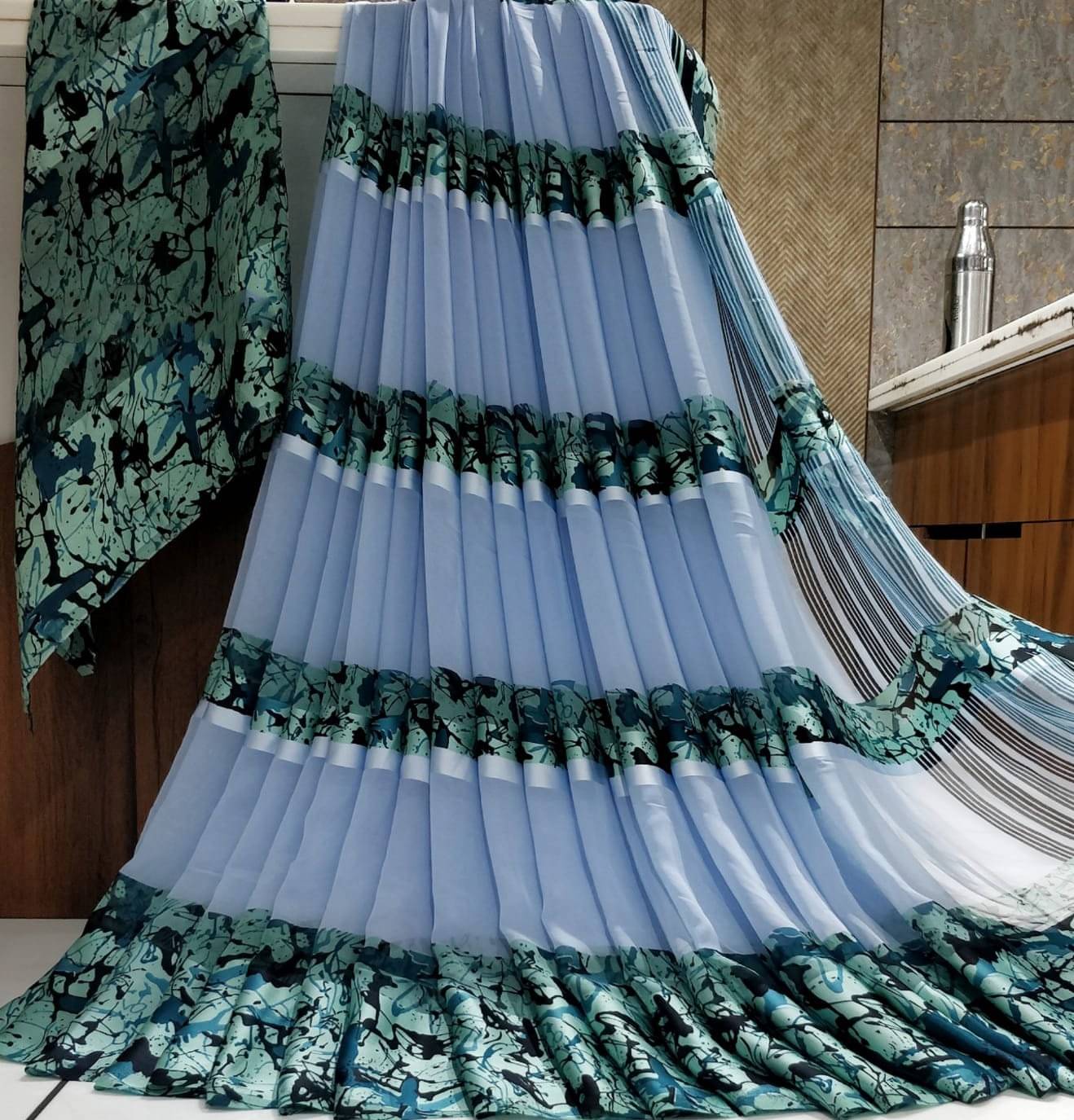     			SHIRODHARI Satin Printed Regular Saree With Unstitched Blouse Piece ( Blue )