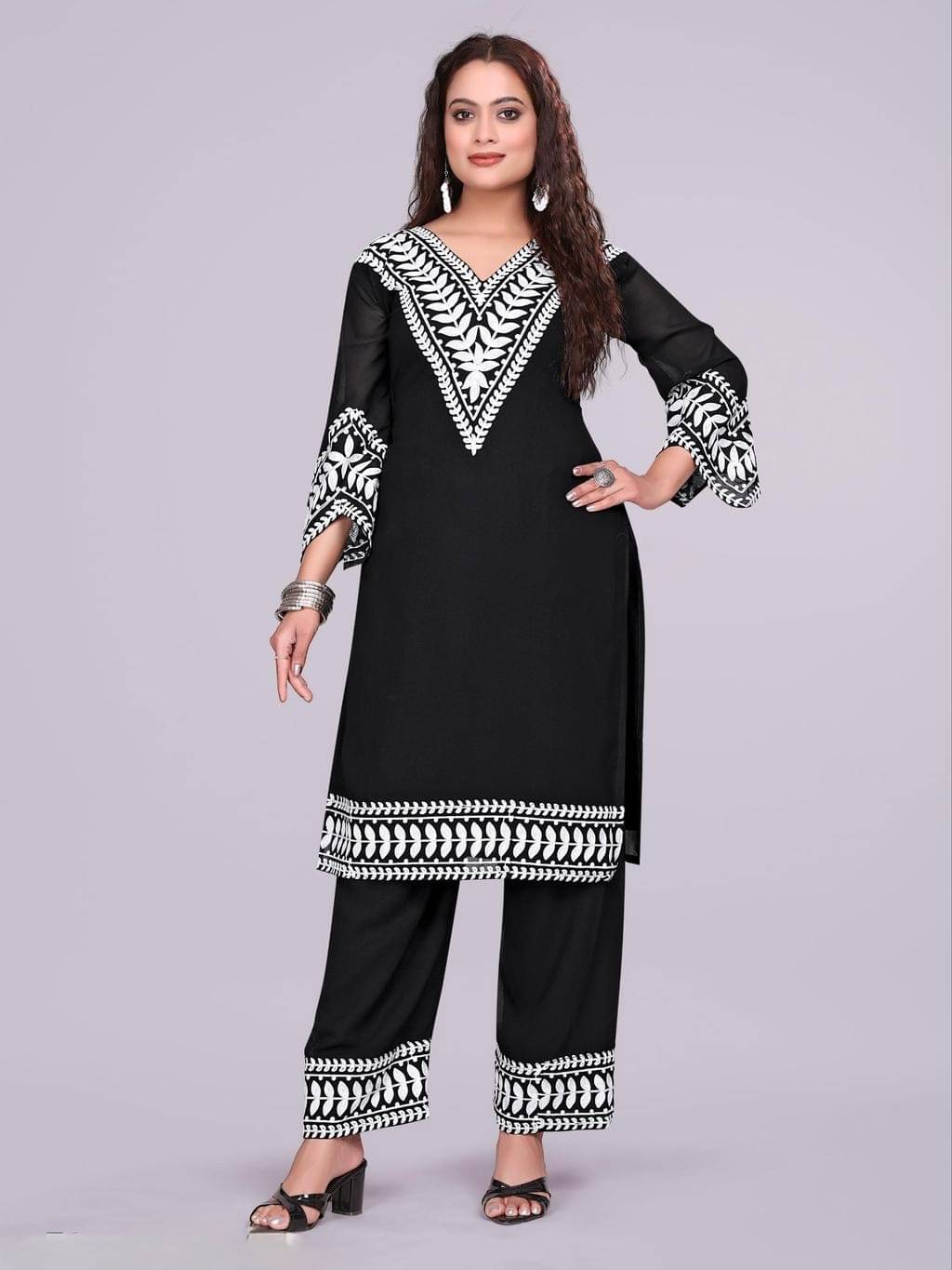     			TUHIRAJ Women Embroidered Top With Trousers Co-Ord Set ( Black )