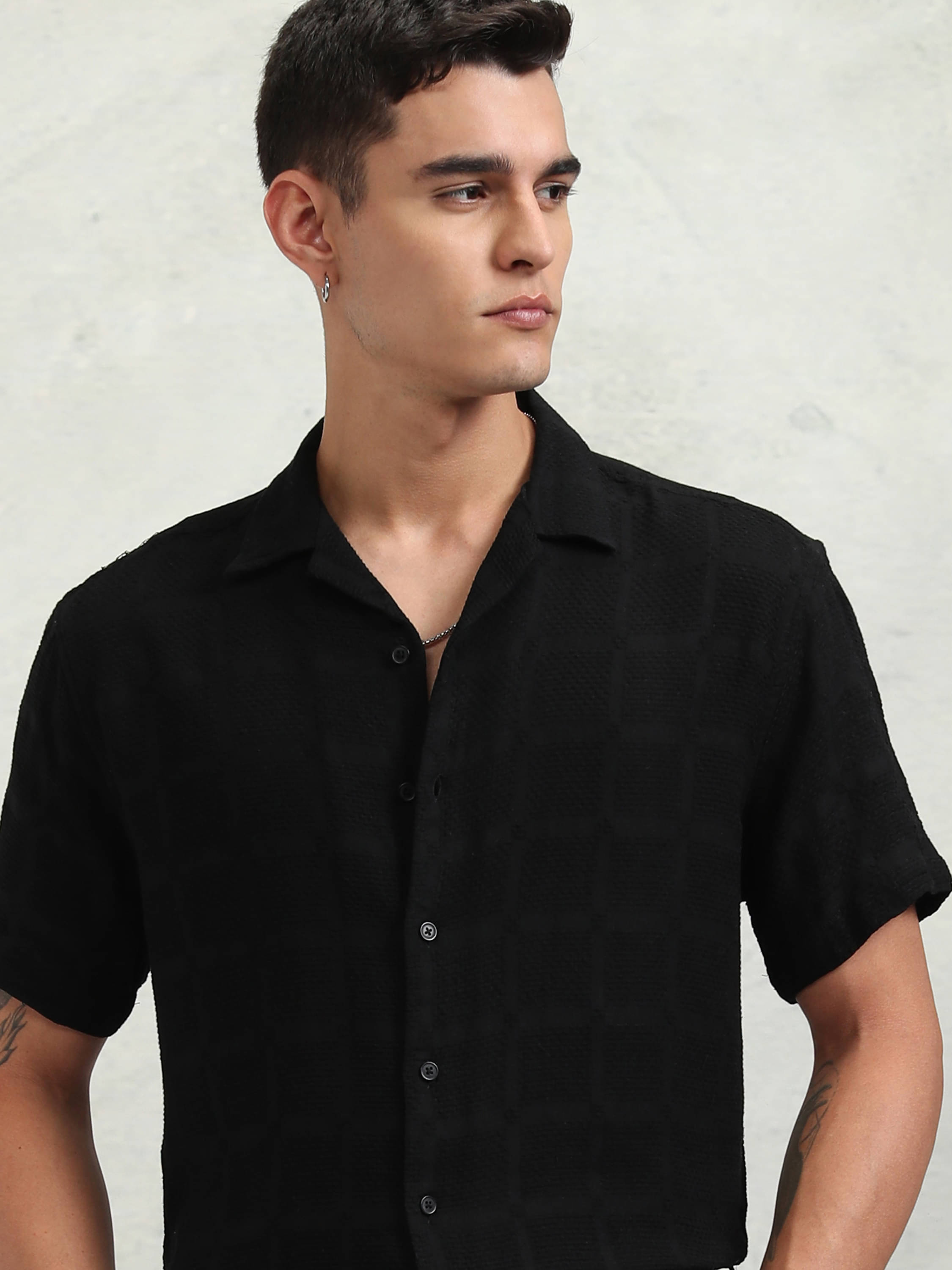 Highlander 100% Cotton Relaxed Fit Self Design Half Sleeves Men's Casual Shirt - Black ( Pack of 1 )     			Highlander 100% Cotton Relaxed Fit Self Design Half Sleeves Men's Casual Shirt - Black ( Pack of 1 )