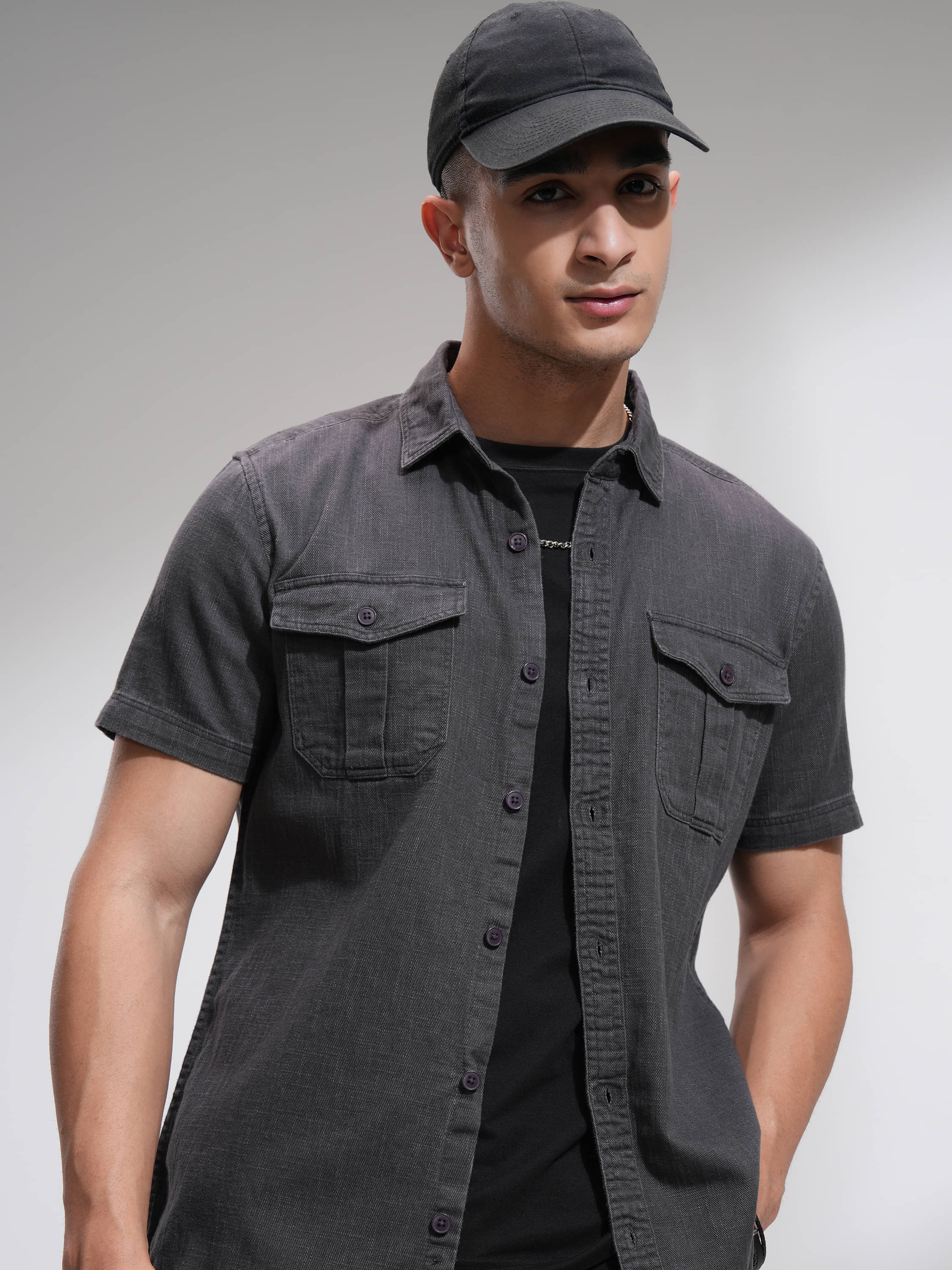 Highlander 100% Cotton Slim Fit Solids Half Sleeves Men's Casual Shirt - Grey ( Pack of 1 )     			Highlander 100% Cotton Slim Fit Solids Half Sleeves Men's Casual Shirt - Grey ( Pack of 1 )