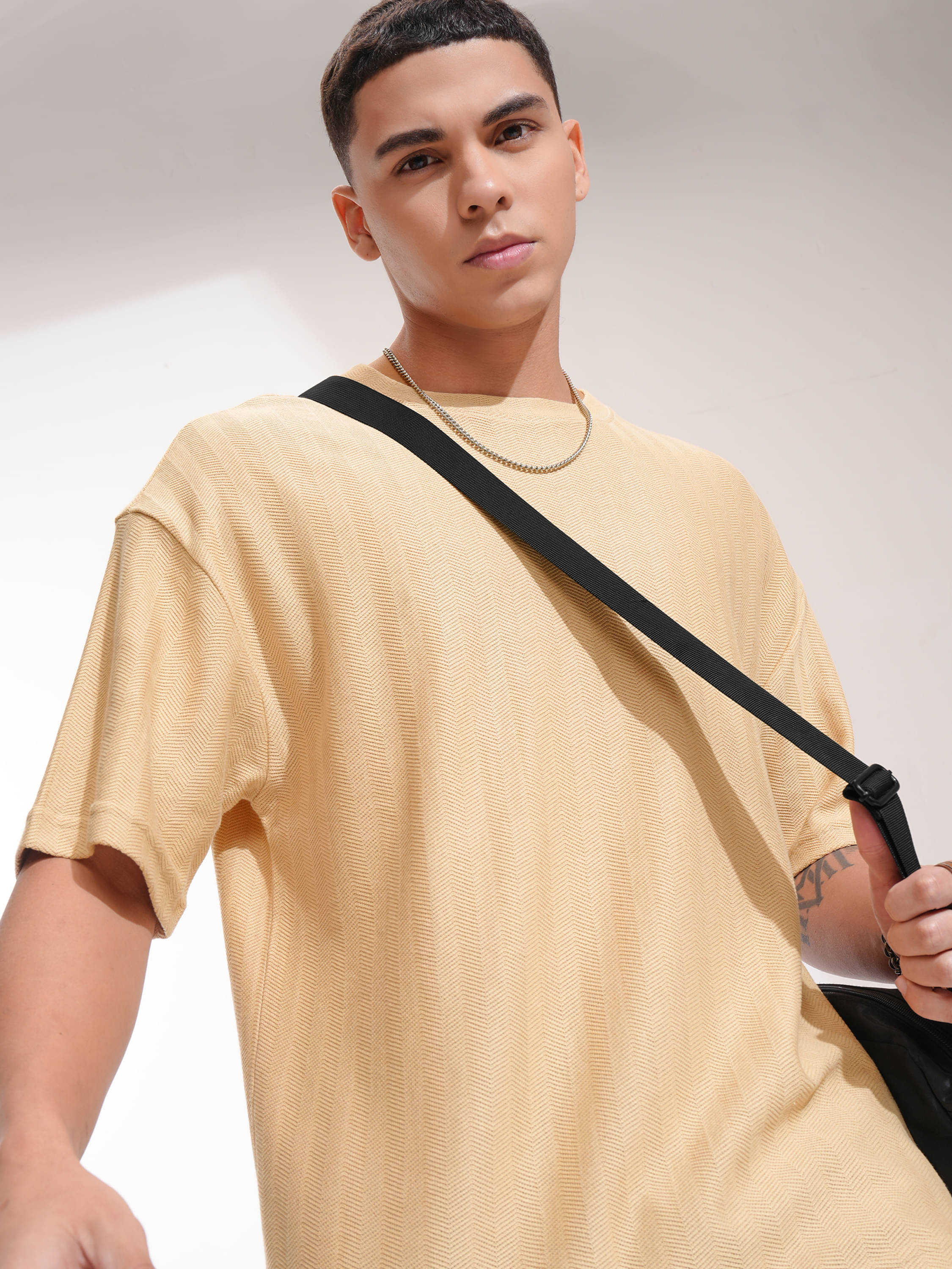     			Highlander Men Cotton Blend Oversized Fit Self Design T-Shirt ( Beige )
