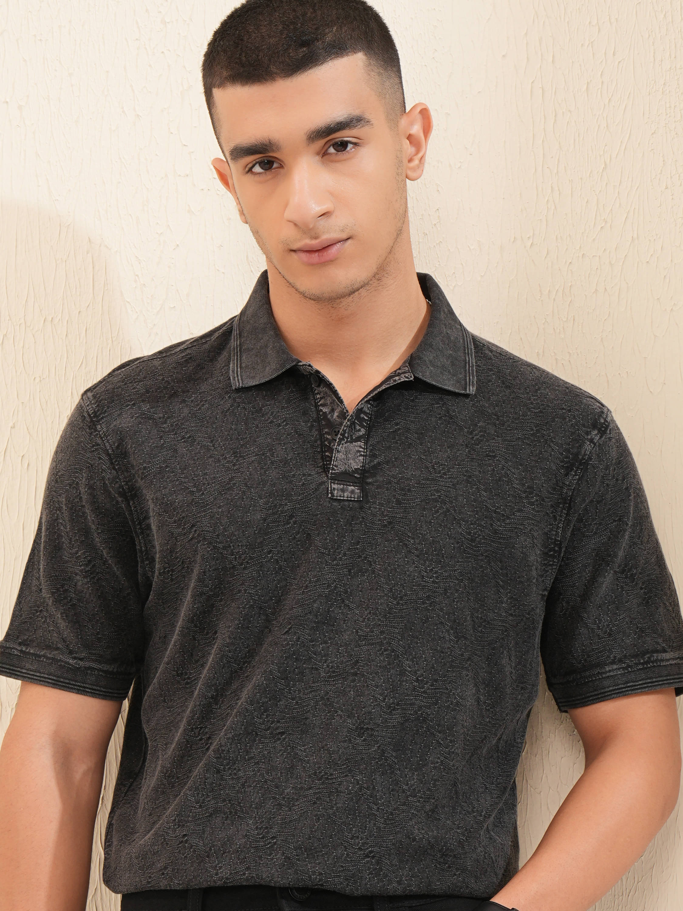     			Highlander Men Cotton Blend Relaxed Fit Self Design Polo T Shirt ( Black )