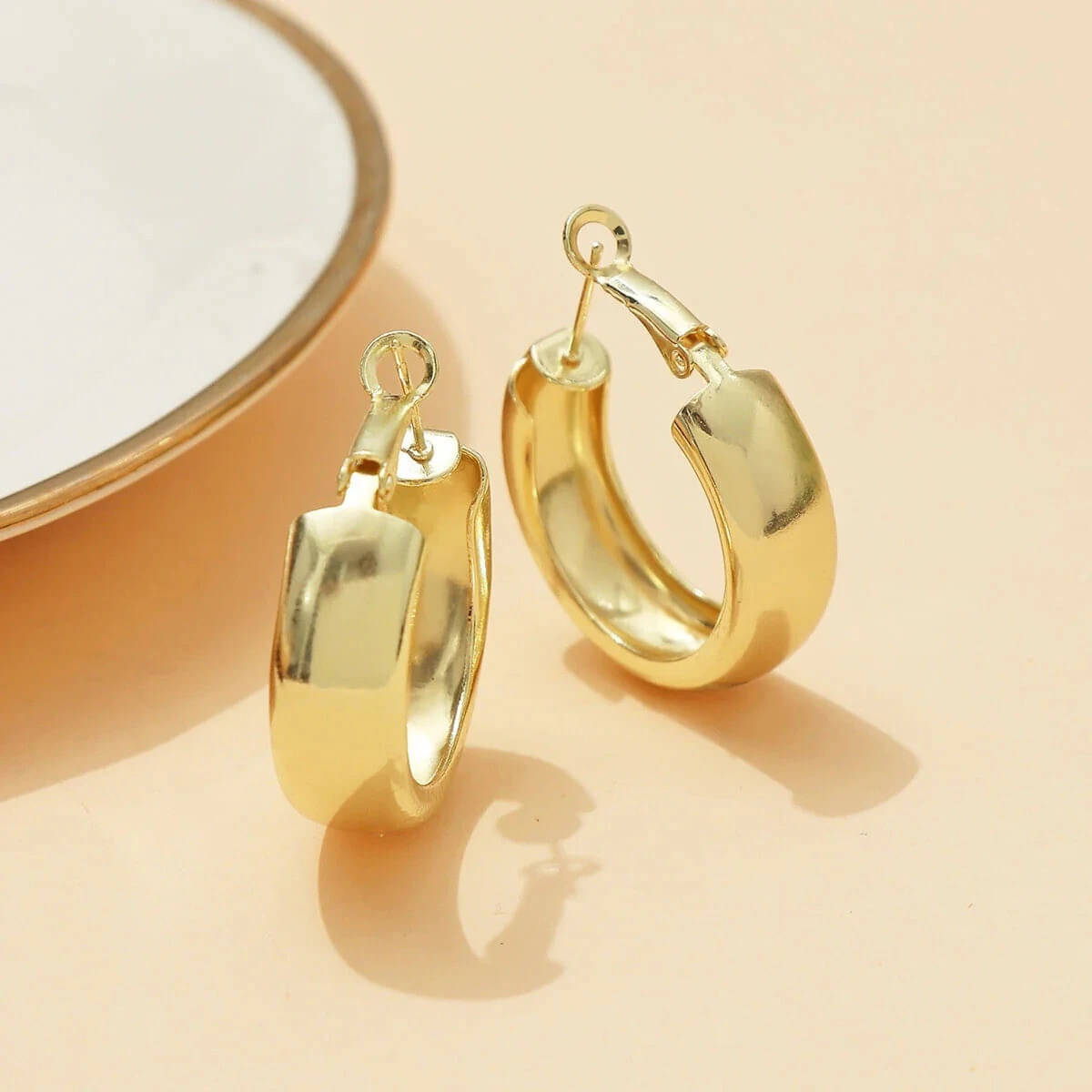     			Lady Raiment Golden Hoops Earrings ( Pack of 1 )