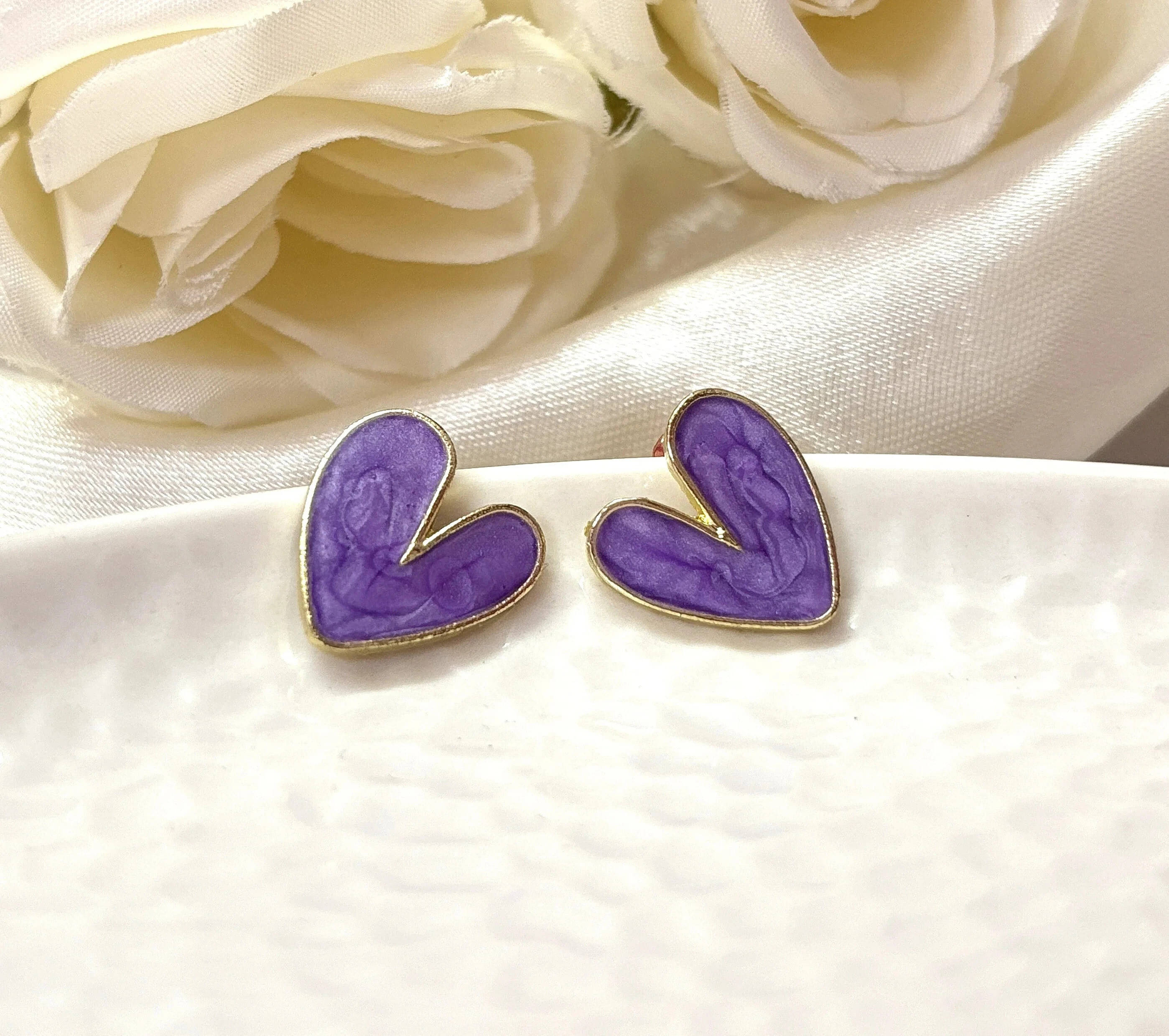     			Lady Raiment Purple Stud Earrings ( Pack of 1 )