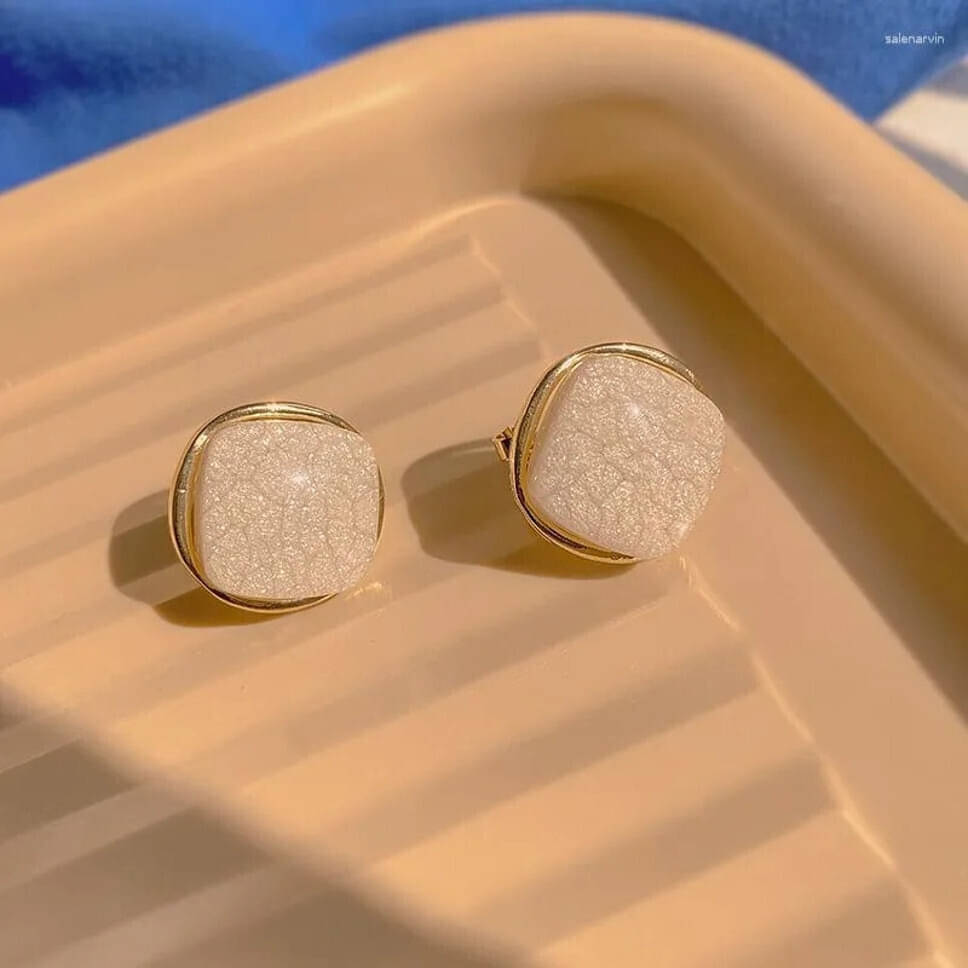     			Lady Raiment White Stud Earrings ( Pack of 1 )