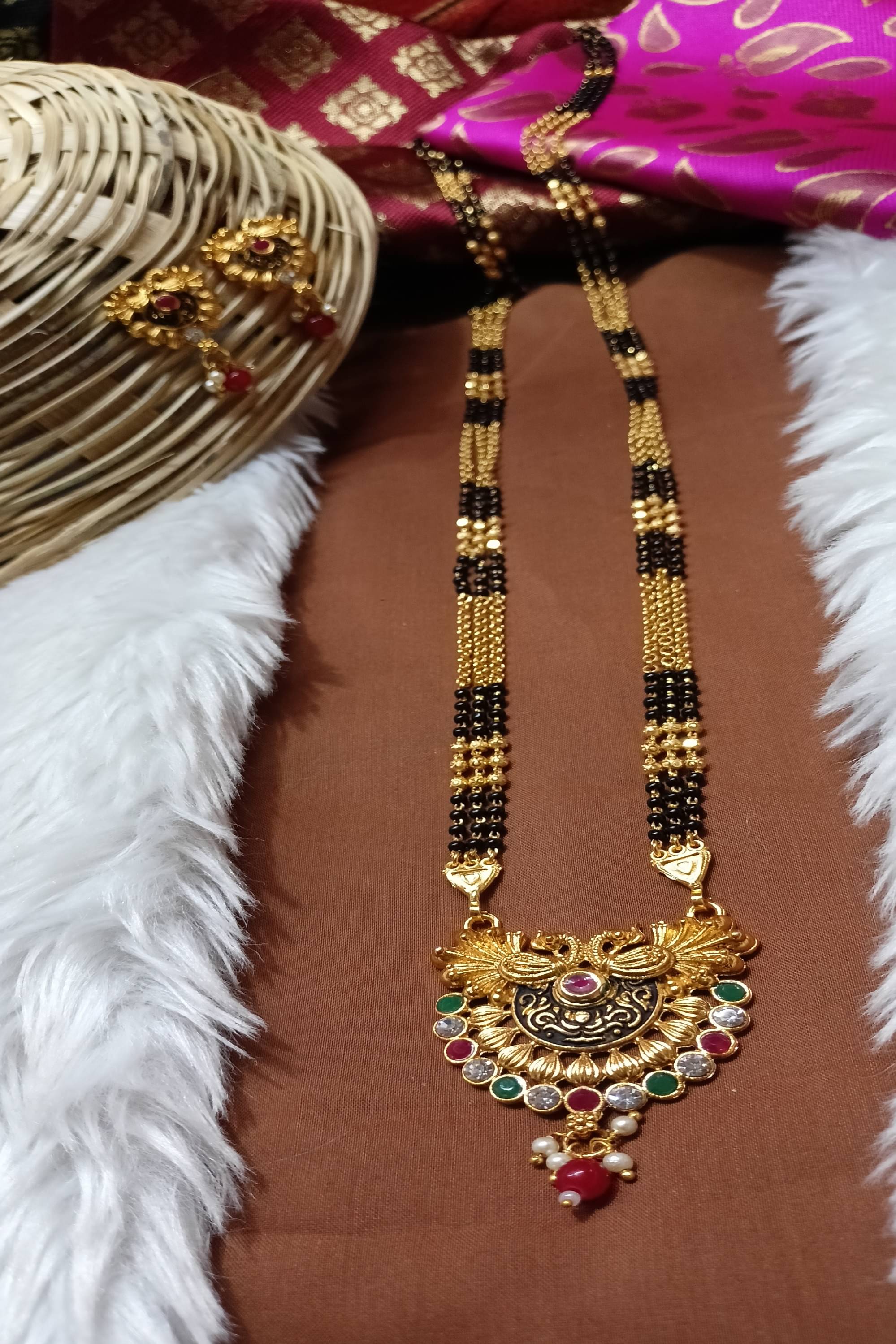 SAJSHRUNGAR JEWELLERY Yellow Mangalsutra Set ( Pack of 1 )     			SAJSHRUNGAR JEWELLERY Yellow Mangalsutra Set ( Pack of 1 )
