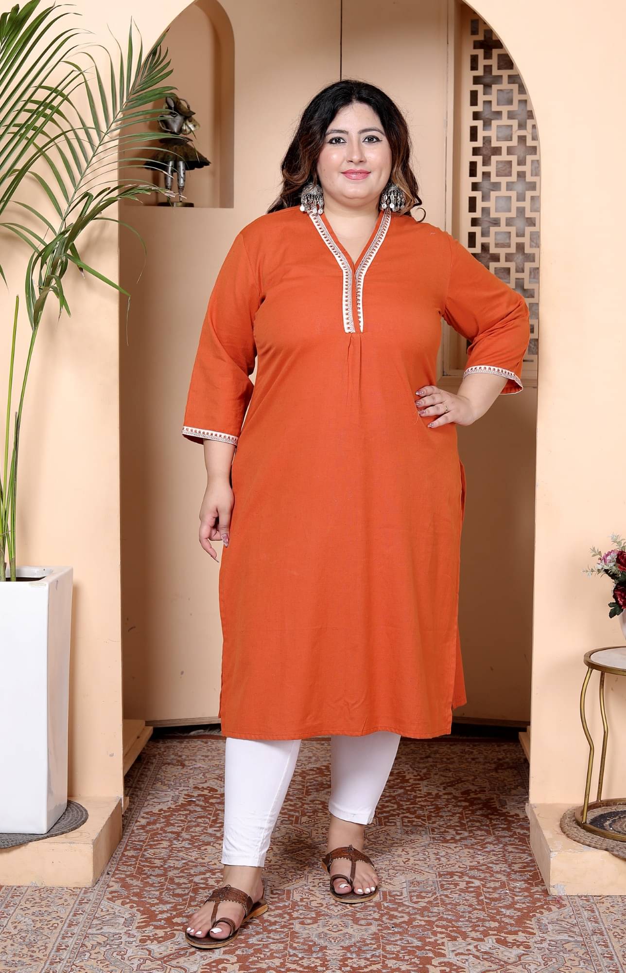     			Tankirti Women Cotton Solid Straight Kurti ( Orange )