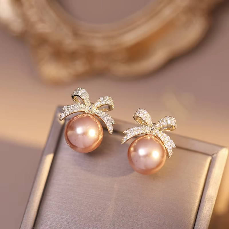     			Buetie Beige Stud Earrings ( Pack of 1 )