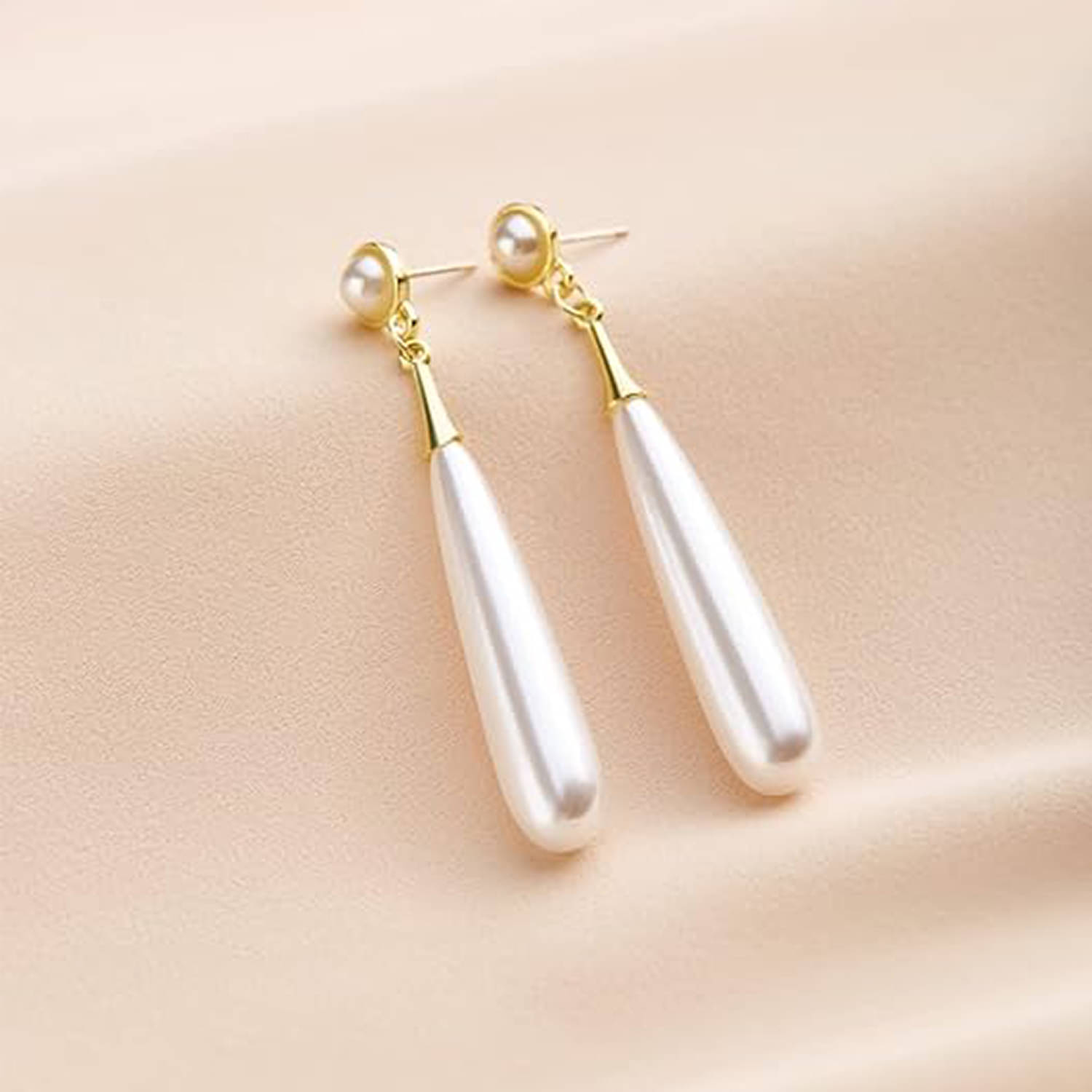     			Buetie White Drop Earrings ( Pack of 1 )