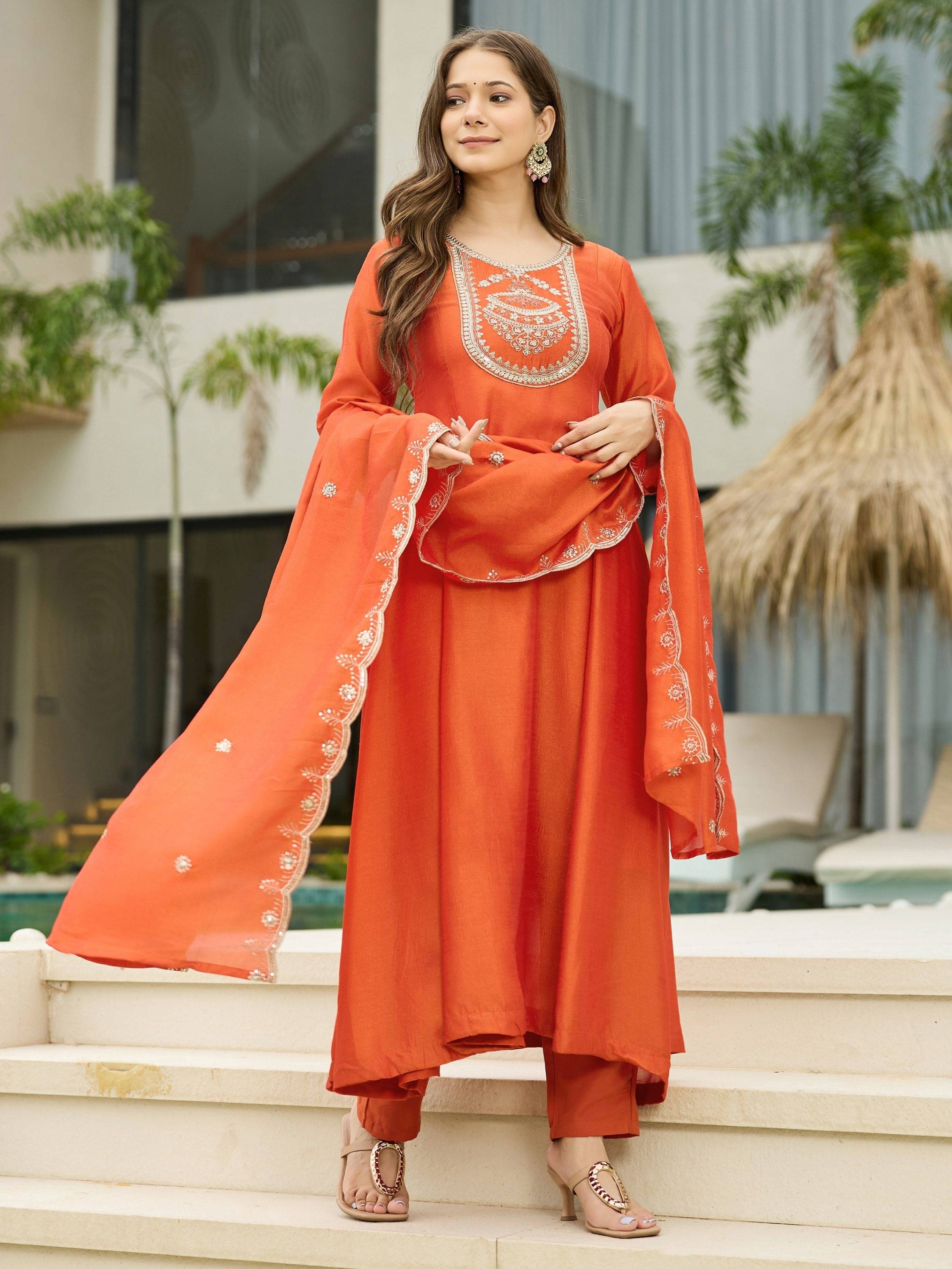     			Eeloo Women Silk Embroidered Straight Kurti With Pants ( Orange )