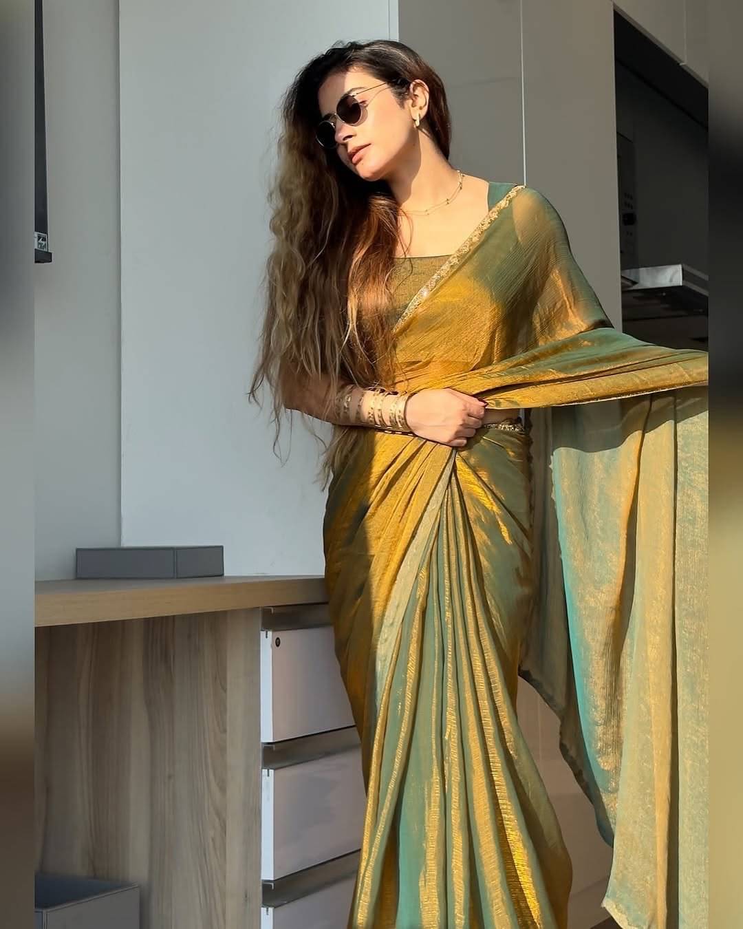 Keyura Jimmy Choo Solid Regular Saree With Unstitched Blouse Piece ( Gold,Rama ) Keyura Jimmy Choo Solid Regular Saree With Unstitched Blouse Piece ( Gold,Rama )