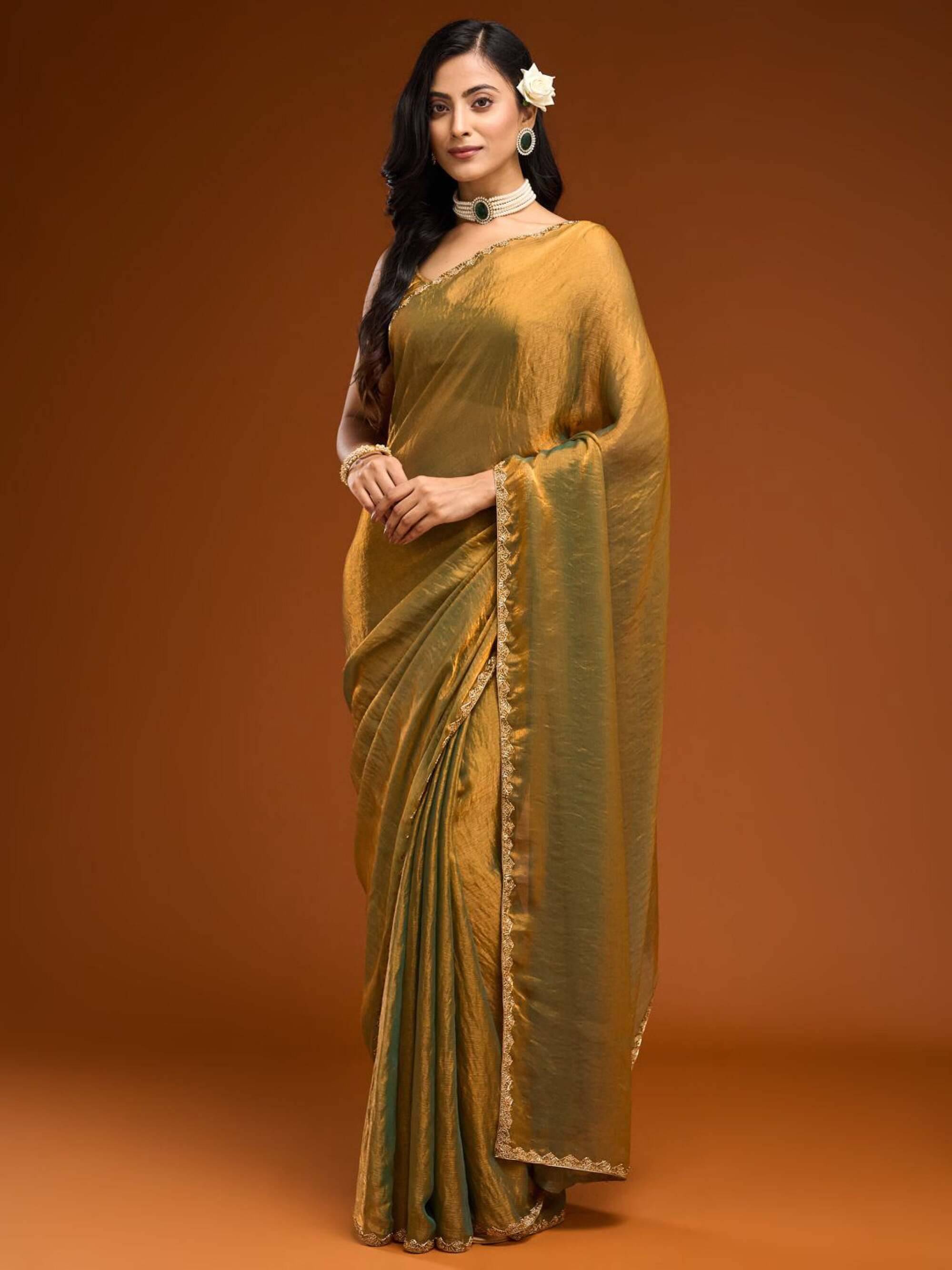 Keyura Jimmy Choo Solid Regular Saree With Unstitched Blouse Piece ( Gold,Rama ) Keyura Jimmy Choo Solid Regular Saree With Unstitched Blouse Piece ( Gold,Rama )